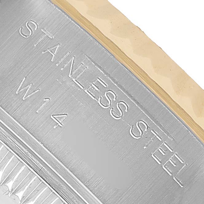 The image shows the engraved text on the stainless steel back or side of a Rolex Datejust 69173 Women's Steel and Gold (two tone) Champagne Dial watch.