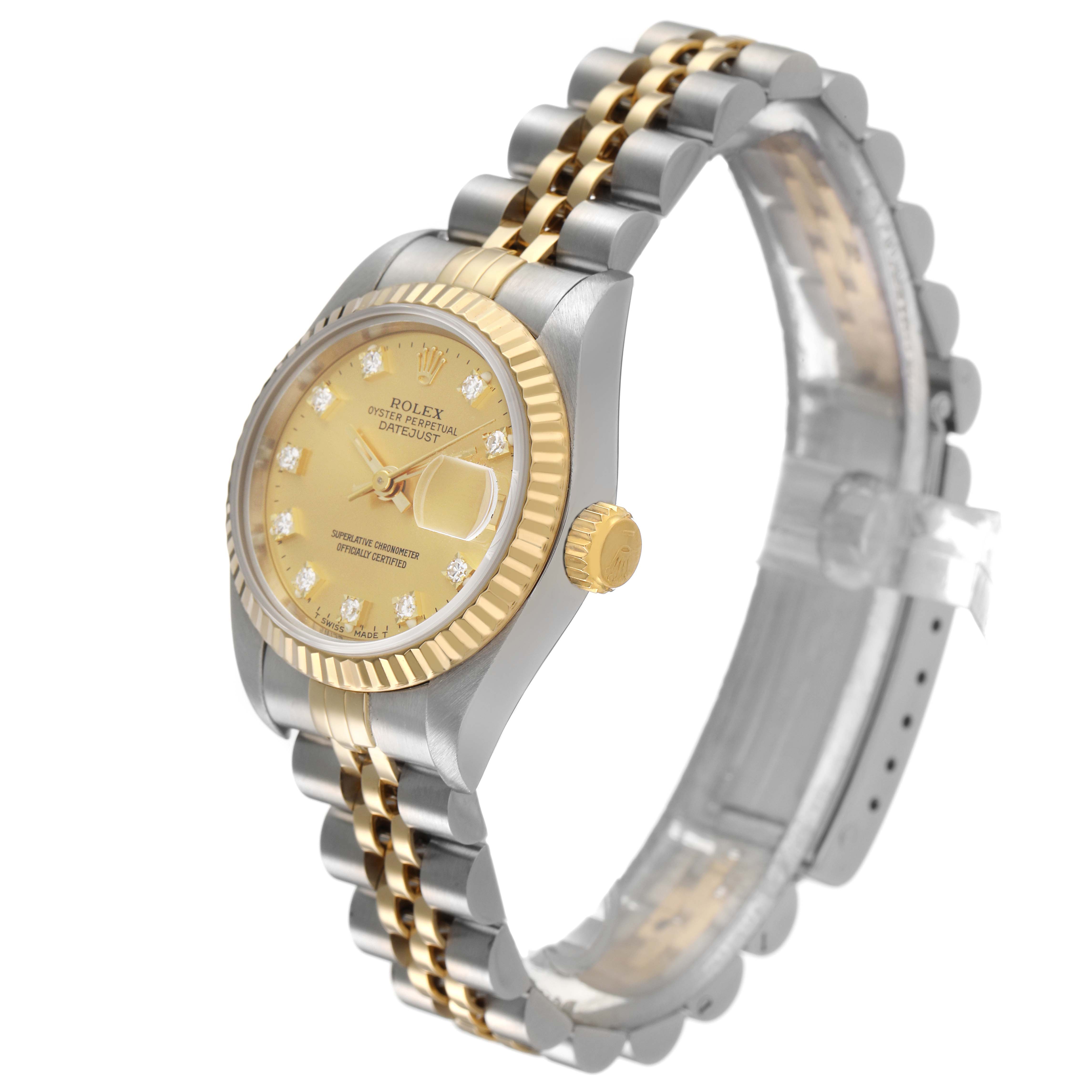 The Rolex Datejust 69173 Women's Stainless Steel Champagne Dial watch is shown at a side angle, displaying the case, fluted bezel, crown, and Jubilee bracelet.