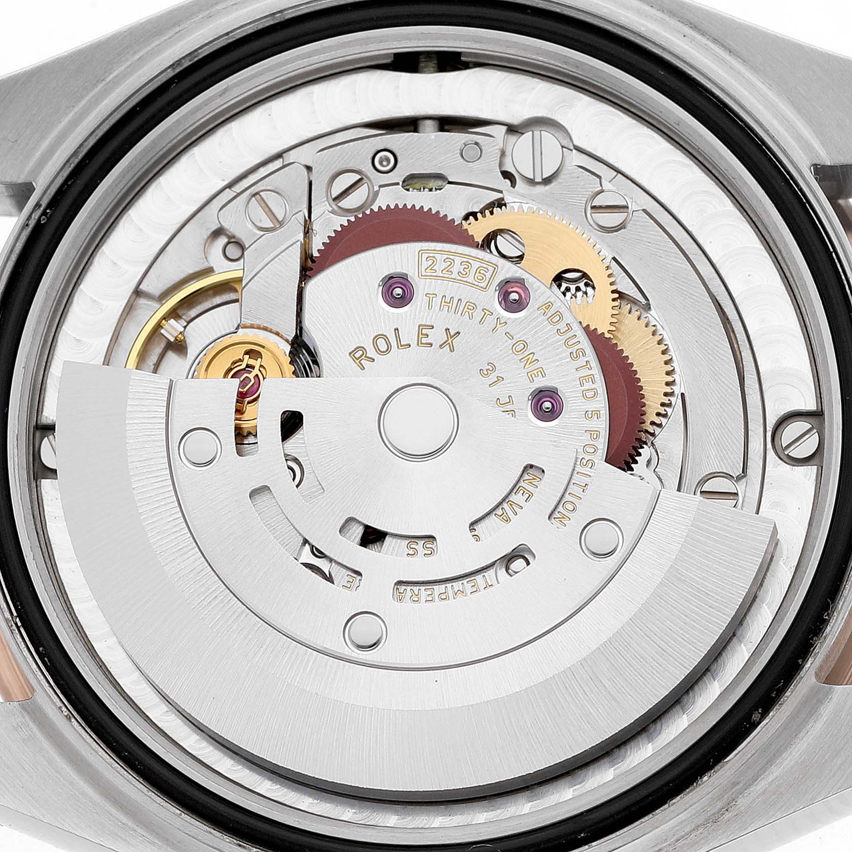 The image shows a close-up of the Rolex Datejust 278271 Women's Stainless Steel Silver Dial movement, focusing on the rotor and gears from the back.