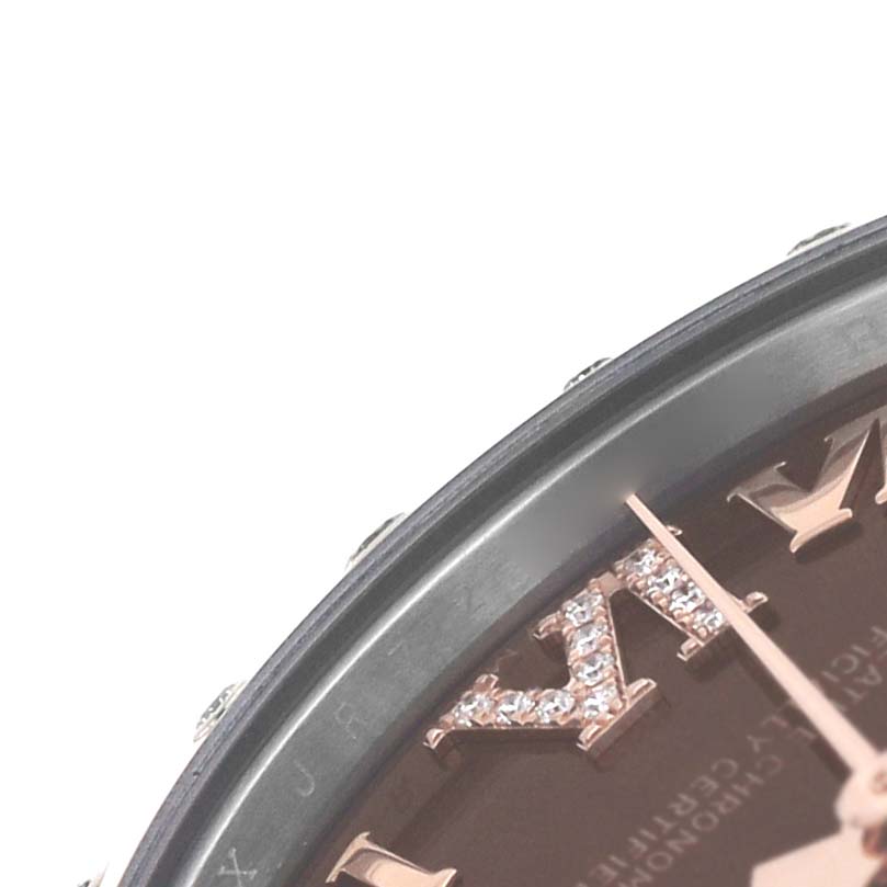 The image shows a close-up of the dial and bezel of a Rolex Datejust 278341 Women's Steel and Gold (two tone) Brown Dial, highlighting the sparkling hour markers and hands.