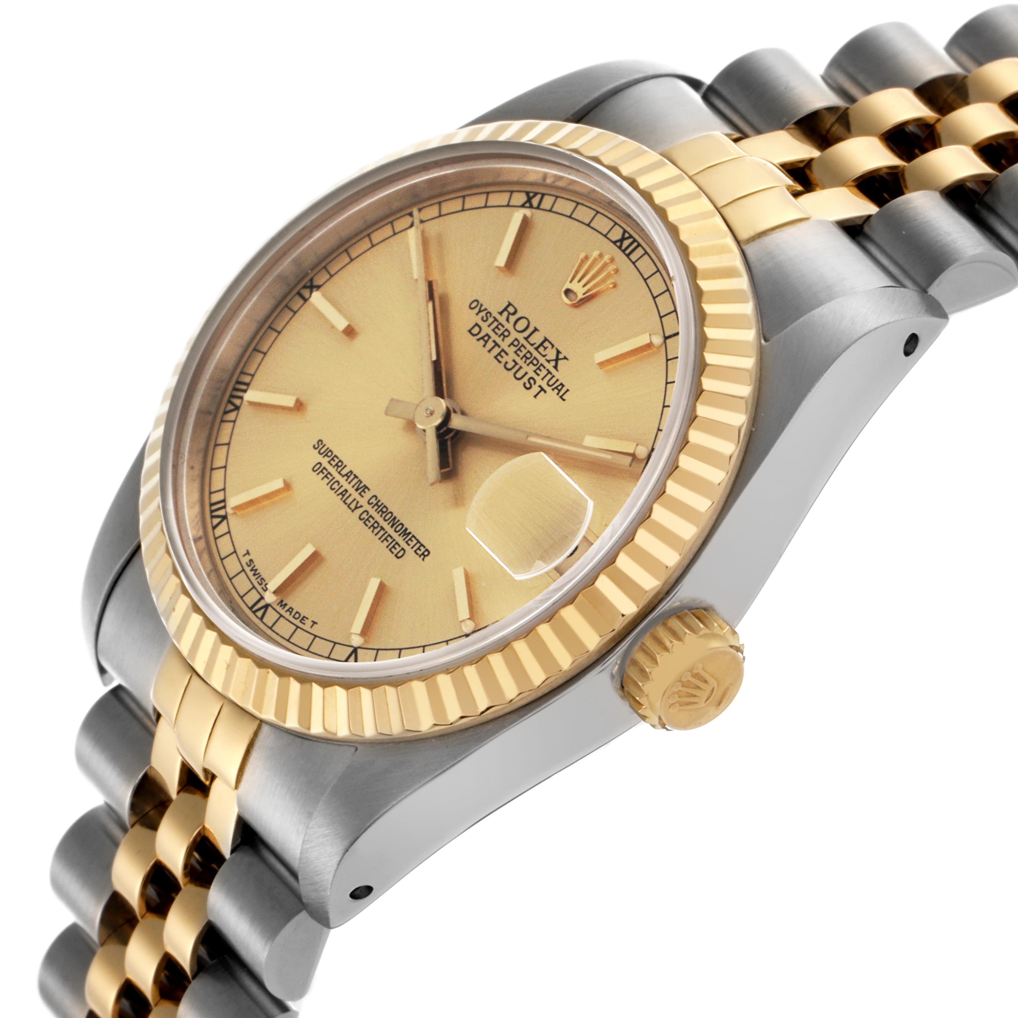 The Rolex Mid-Size 68273 Women's Steel and Gold (two tone) Champagne Dial 68273 Women's Steel and Gold (two tone) Champagne Dial watch is shown in a side angle, highlighting the gold bezel, crown, and two-tone bracelet.