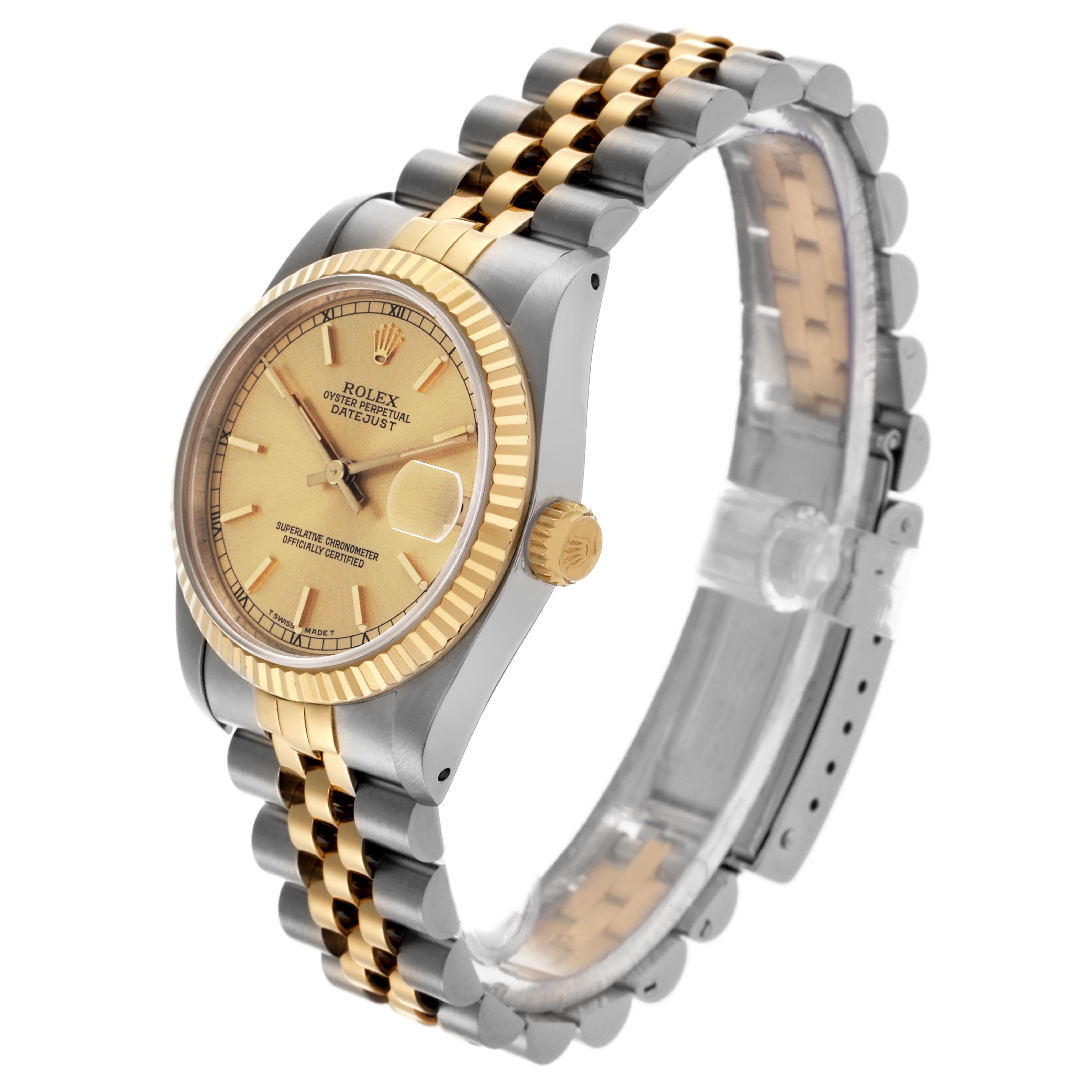 The Rolex Mid-Size 68273 Women's Steel and Gold (two tone) Champagne Dial 68273 Women's Steel and Gold (two tone) Champagne Dial watch is shown at a three-quarter angle, displaying the face, side, and two-tone bracelet.