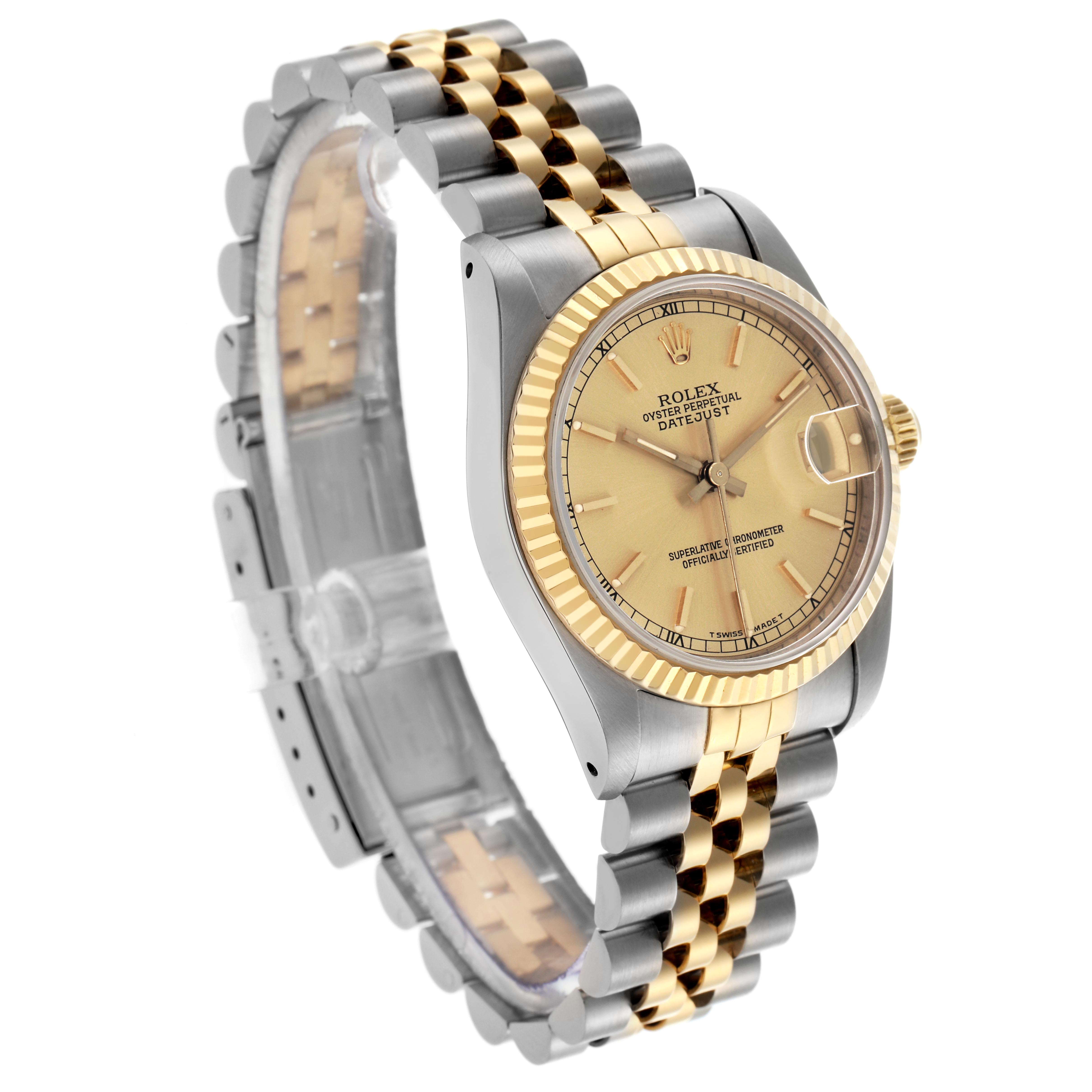 The Rolex Mid-Size 68273 Women's Steel and Gold (two tone) Champagne Dial 68273 Women's Steel and Gold (two tone) Champagne Dial watch is shown at a slight angle, highlighting the bezel, dial, and two-tone bracelet.