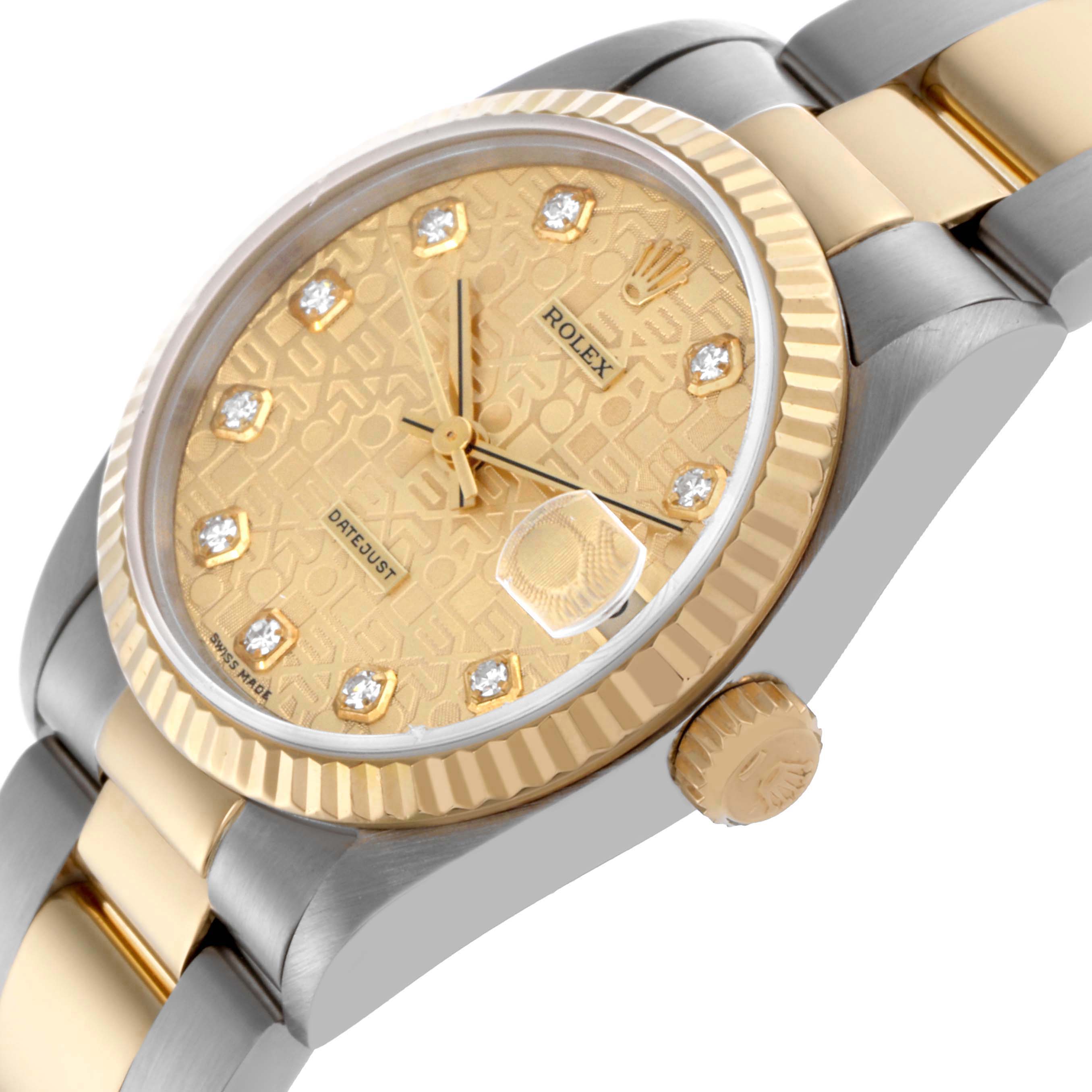 The watch is a Rolex Mid-Size 68273 Women's Steel and Gold (two tone) Champagne Dial 68273 Women's Steel and Gold (two tone) Champagne Dial shown at an angled view, highlighting its gold dial, bezel, and two-tone bracelet.