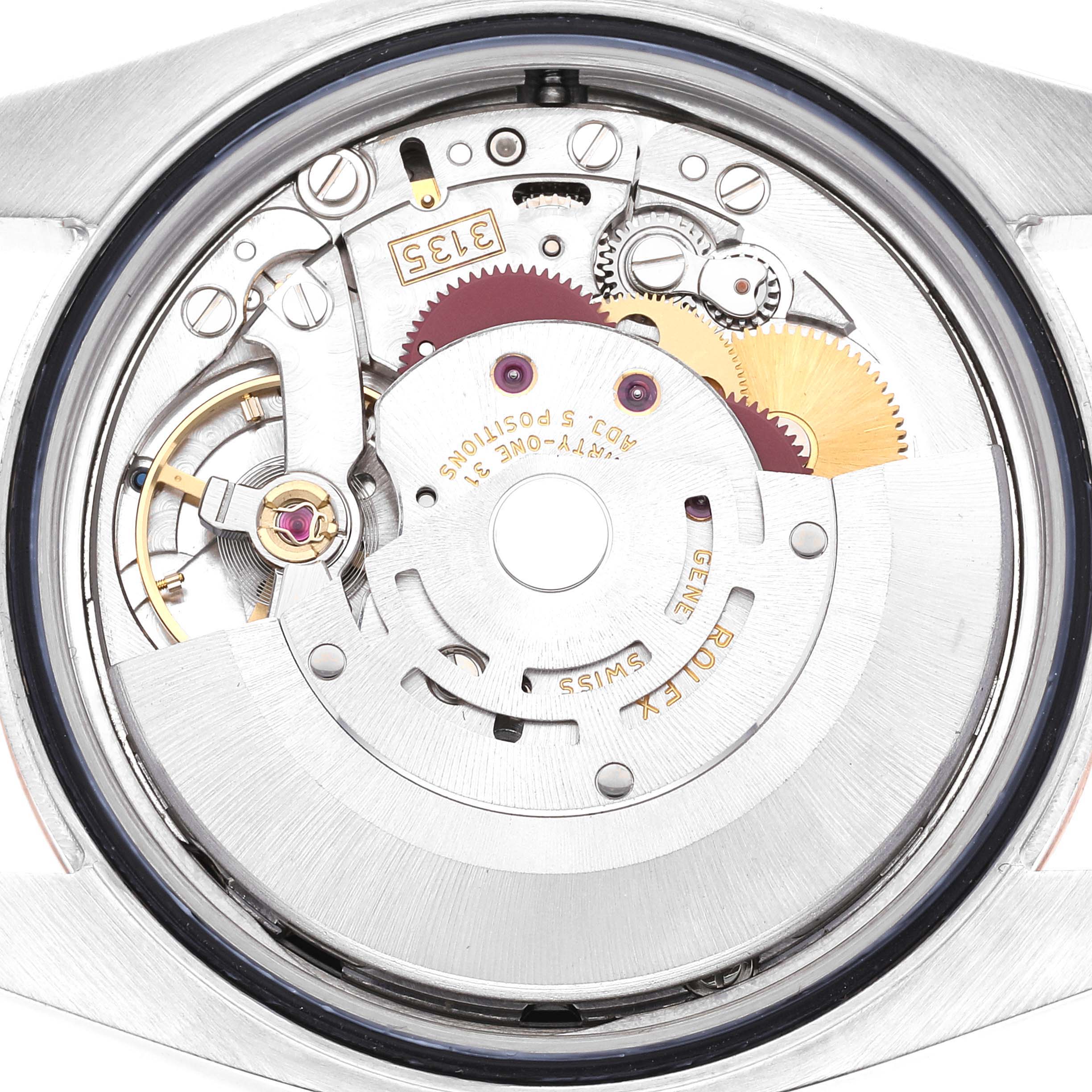 This image shows the internal mechanics of the Rolex Datejust 116231 Men's Steel and Gold (two tone) Black Dial 116231 Men's Steel and Gold (two tone) Black Dial watch from the back view, highlighting the movement components.