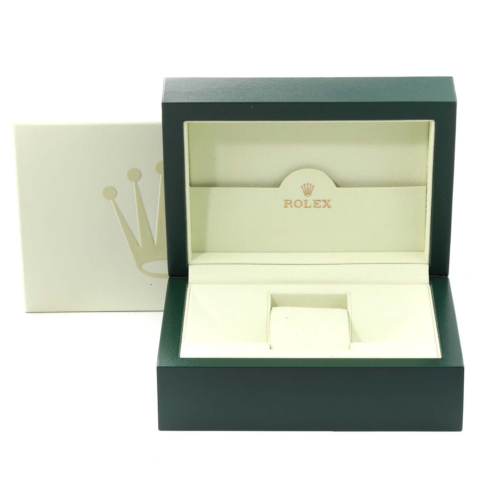 This image shows an open green Rolex Datejust 116231 Men's Steel and Gold (two tone) Black Dial 116231 Men's Steel and Gold (two tone) Black Dial watch box with the beige interior and the Rolex logo.