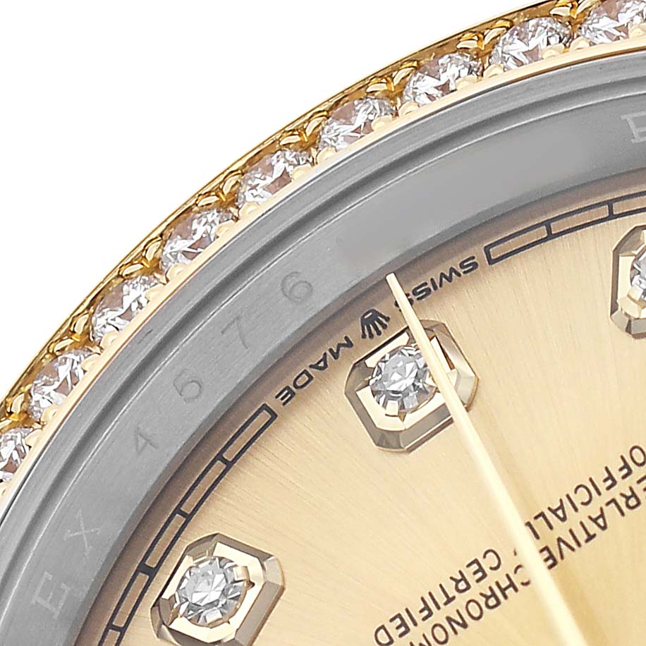 The image shows a close-up of the bezel and dial of a Rolex Datejust 126283RBR Men's Steel and Gold (two tone) Champagne Dial, featuring diamond embellishments and part of the watch face.