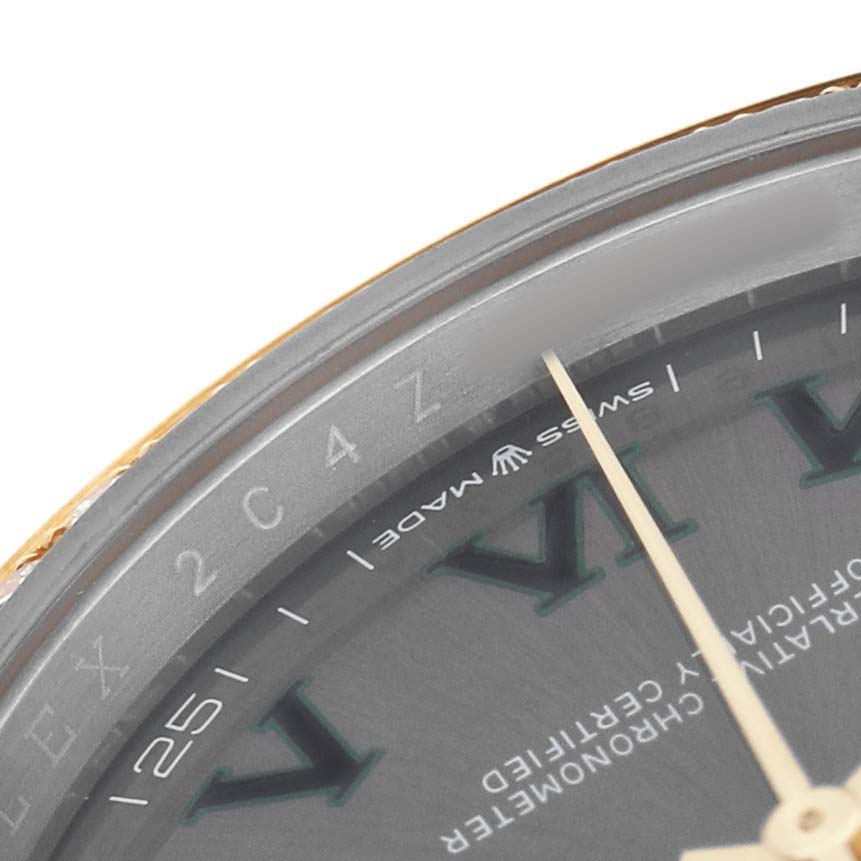 The image shows a partial close-up of the Rolex Datejust 126283 Men's Steel and Gold (two tone) Grey Dial watch face, focusing on the bezel, a portion of the dial, and hands.