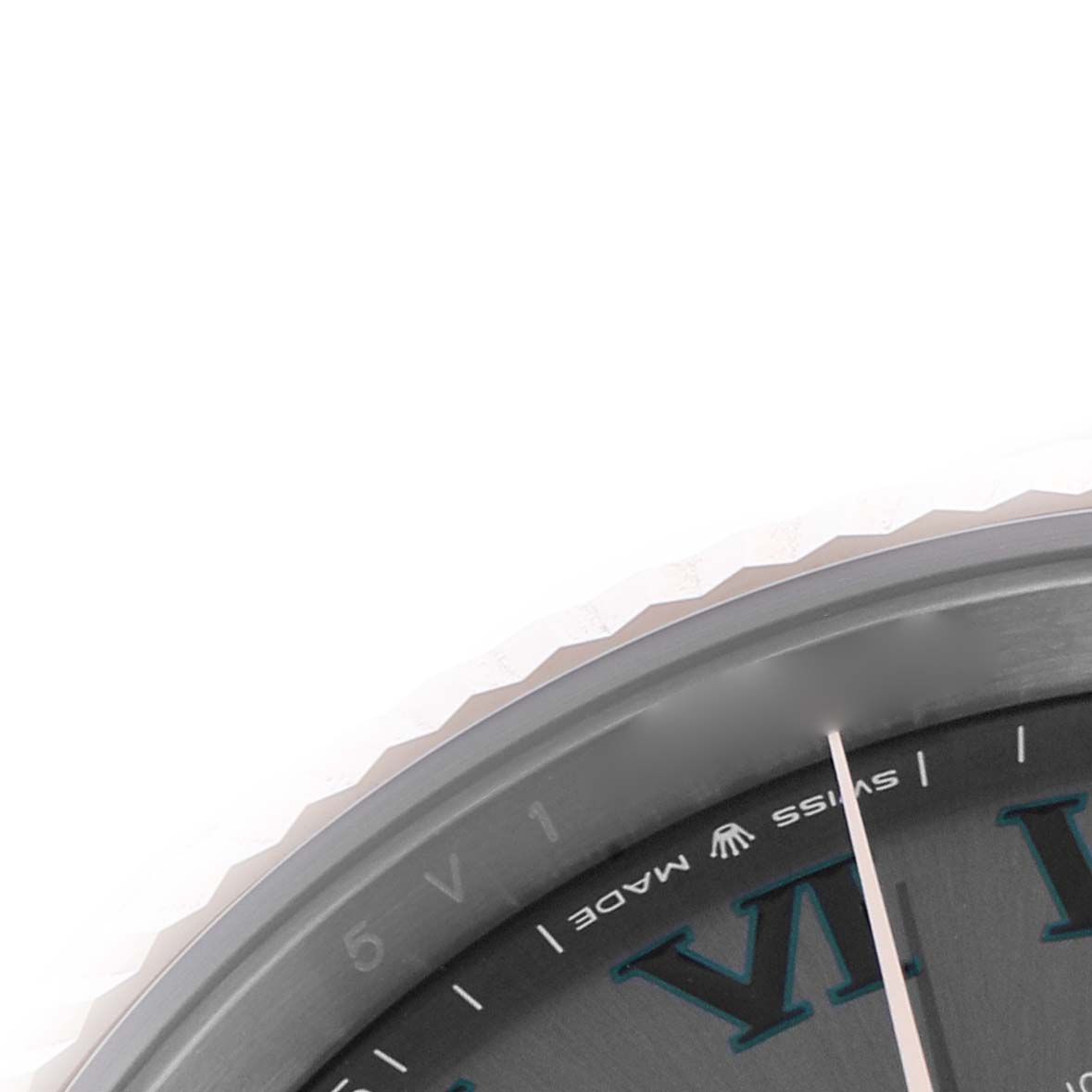 The image shows a close-up of the Rolex Datejust 41 126331 Men
s Steel and Gold (two tone) Grey Dial 126331 Men
s Steel and Gold (two tone) Grey Dial
s bezel and part of the dial, featuring Roman numerals.