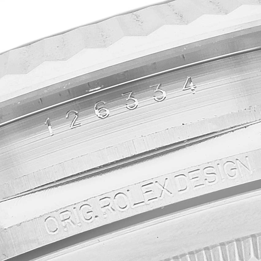 This image shows a close-up of the case side and bezel of the Rolex Datejust 41 126334 Men
s Stainless Steel Grey Dial 126334 Men
s Stainless Steel Grey Dial model, highlighting the serial number and "ORIG. ROLEX DESIGN" engraving.