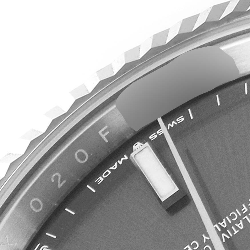 This close-up angle shows the bezel and part of the dial of a Rolex Datejust 41 126334 Men
s Stainless Steel Grey Dial 126334 Men
s Stainless Steel Grey Dial watch.