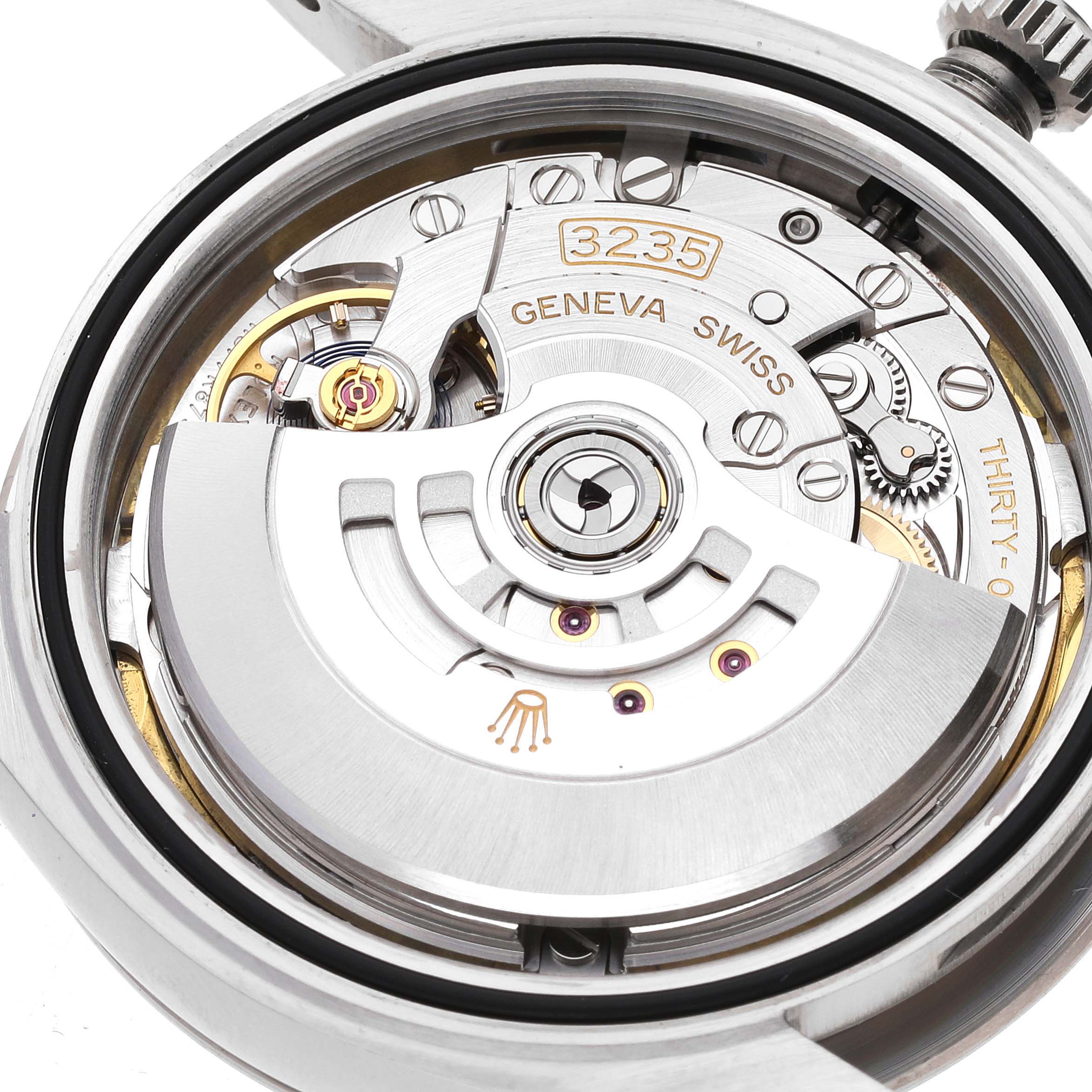 The image shows a close-up view of the movement mechanism of a Rolex Datejust 41 126334 Men's Stainless Steel White Dial 126334 Men's Stainless Steel White Dial watch.