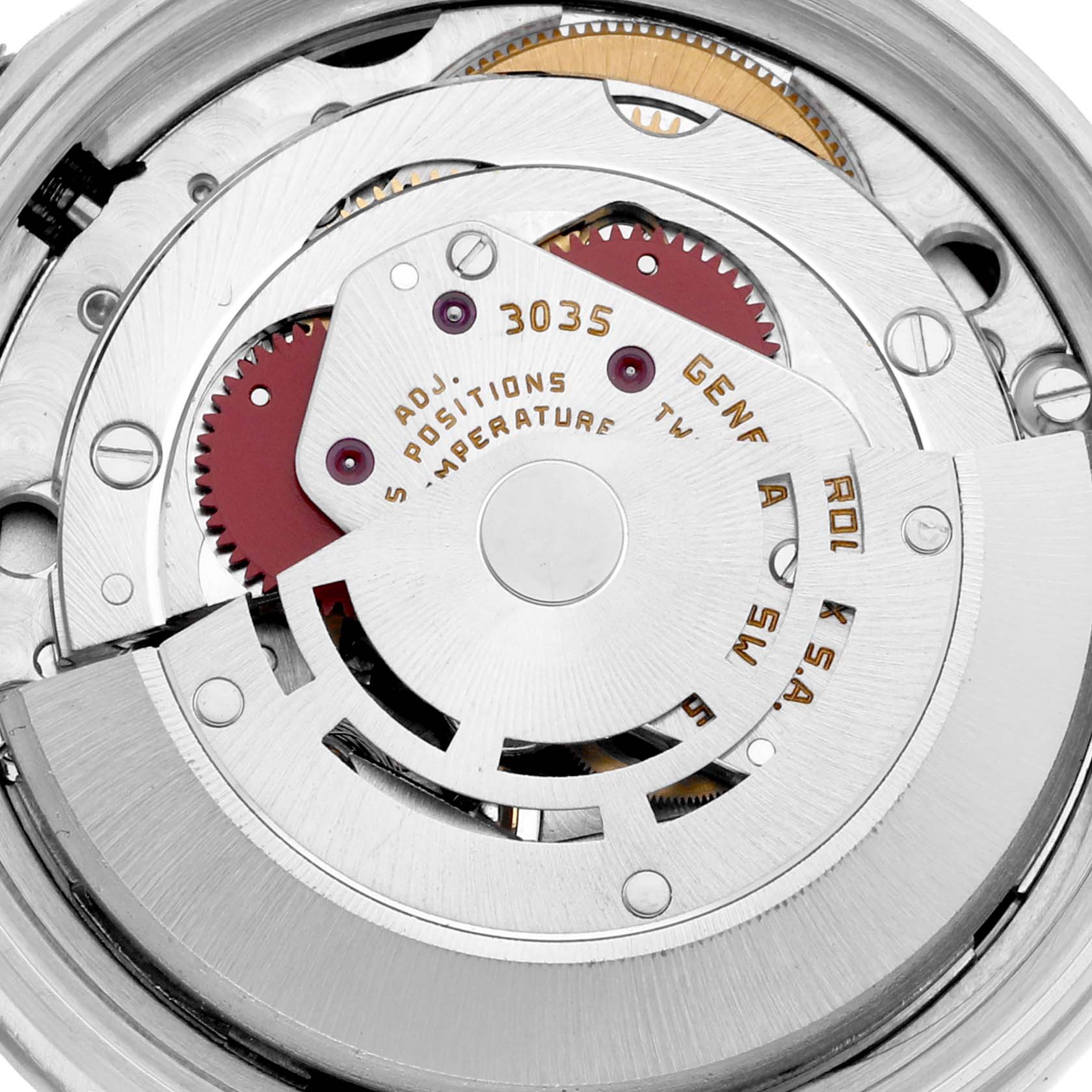 This is a close-up view of the movement mechanism inside a Rolex Vintage Collection 16030 Men's Stainless Steel Silver Dial 16030 Men's Stainless Steel Silver Dial model, showcasing gears and engravings.