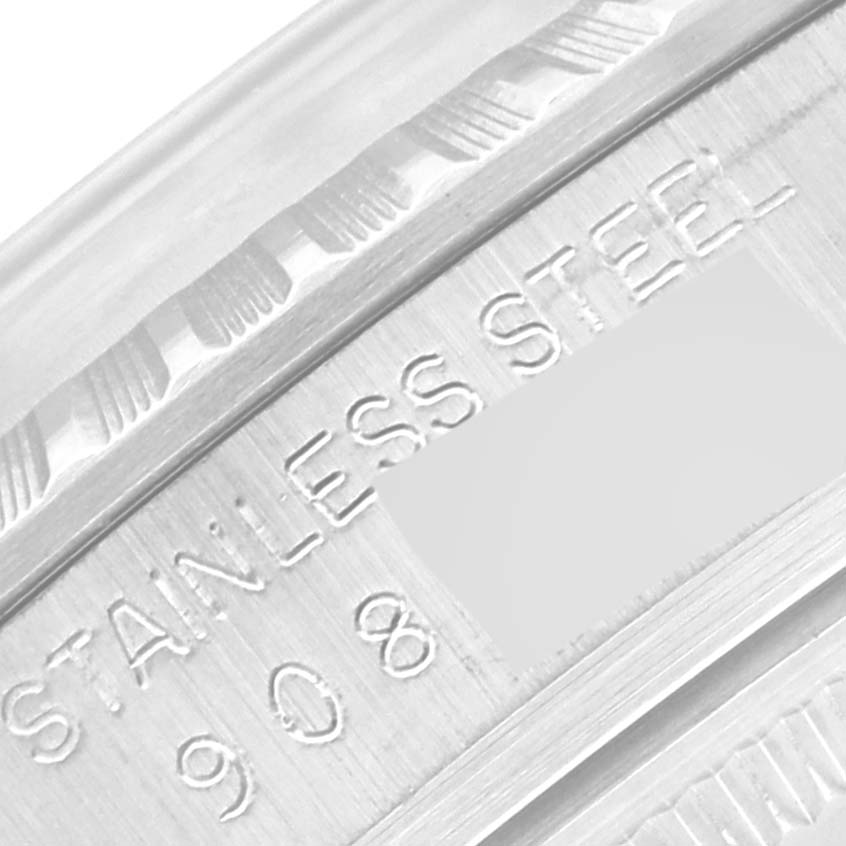 The image shows a close-up of the stainless steel casing and engravings of the Vintage Collection model by Rolex.
