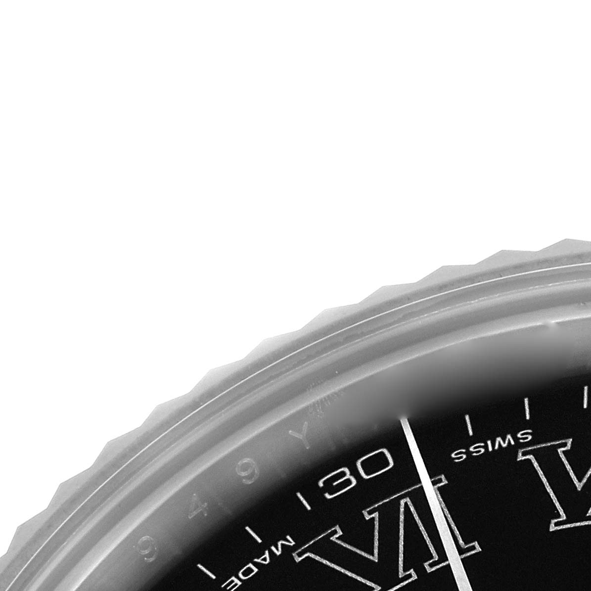 The image shows a partial close-up of a Rolex Datejust 41 116334 Men
s Stainless Steel Grey Dial 116334 Men
s Stainless Steel Grey Dial
s bezel and dial with Roman numerals.