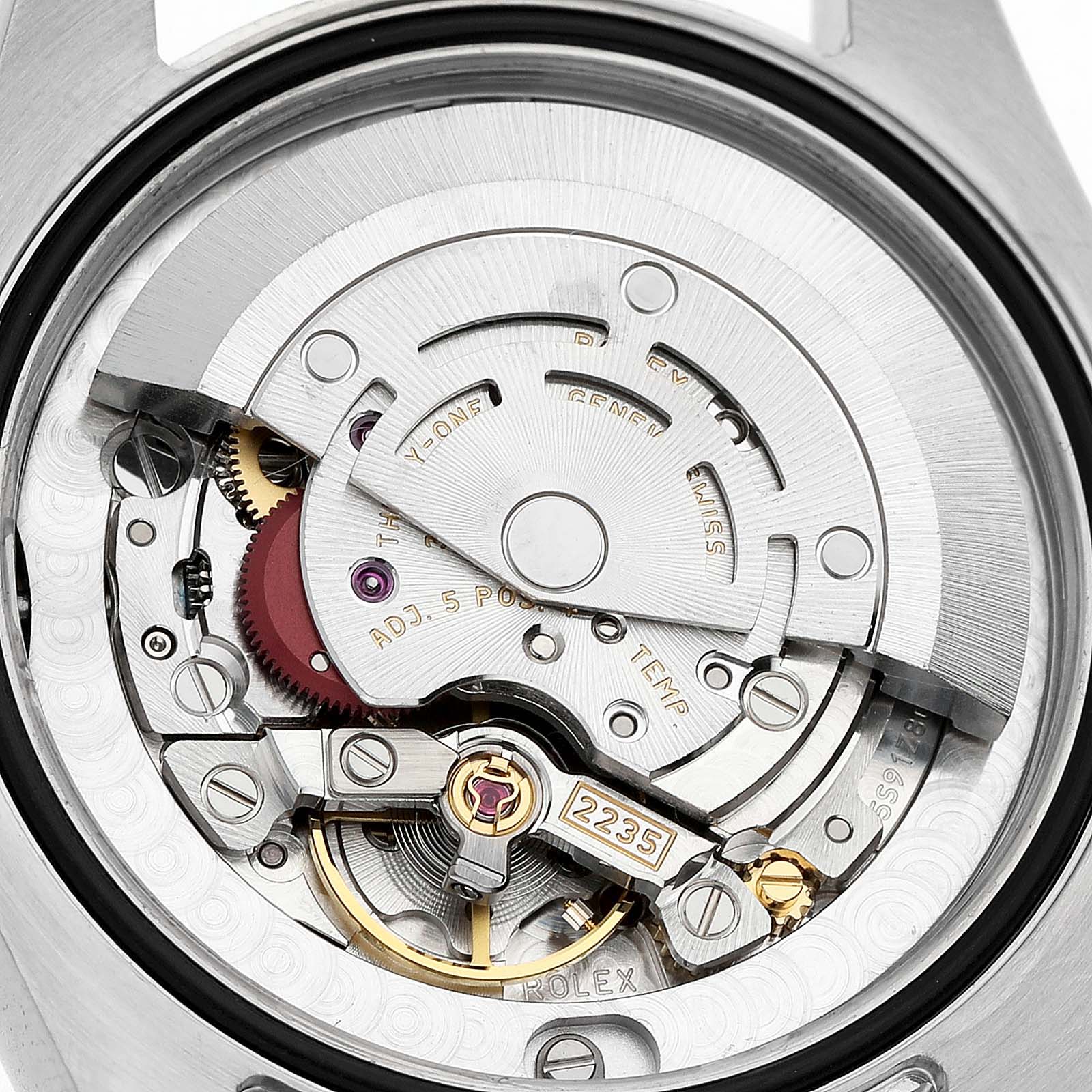 The image shows the movement and mechanism of a Rolex Mid-Size 178343 Women's Steel and Gold (two tone) Champagne Dial watch from the back.