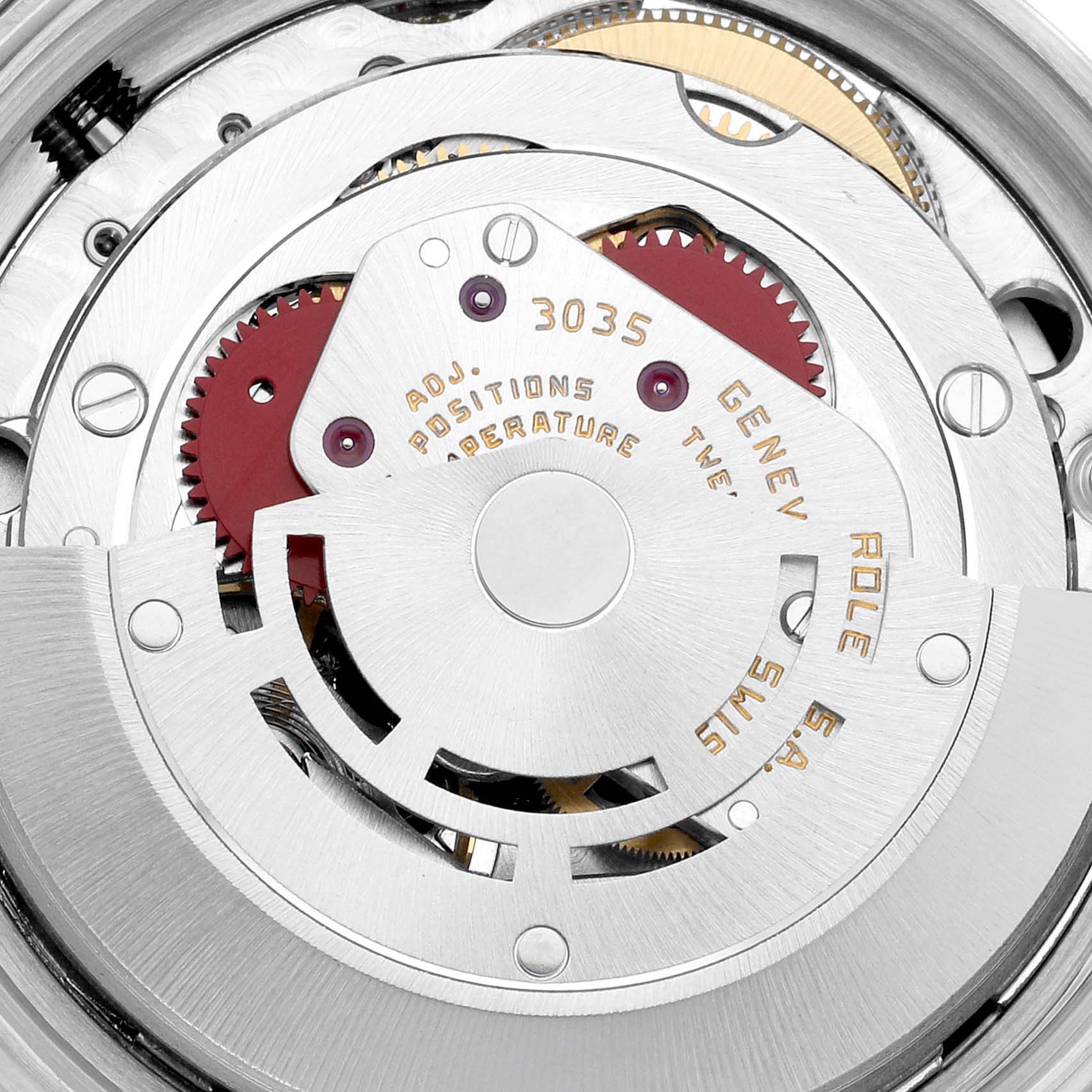 The image shows the inner mechanical movement of a Rolex Vintage Collection 16013 Men's Steel and Gold (two tone) Silver Dial 16013 Men's Steel and Gold (two tone) Silver Dial model watch, highlighting gears and inscriptions.