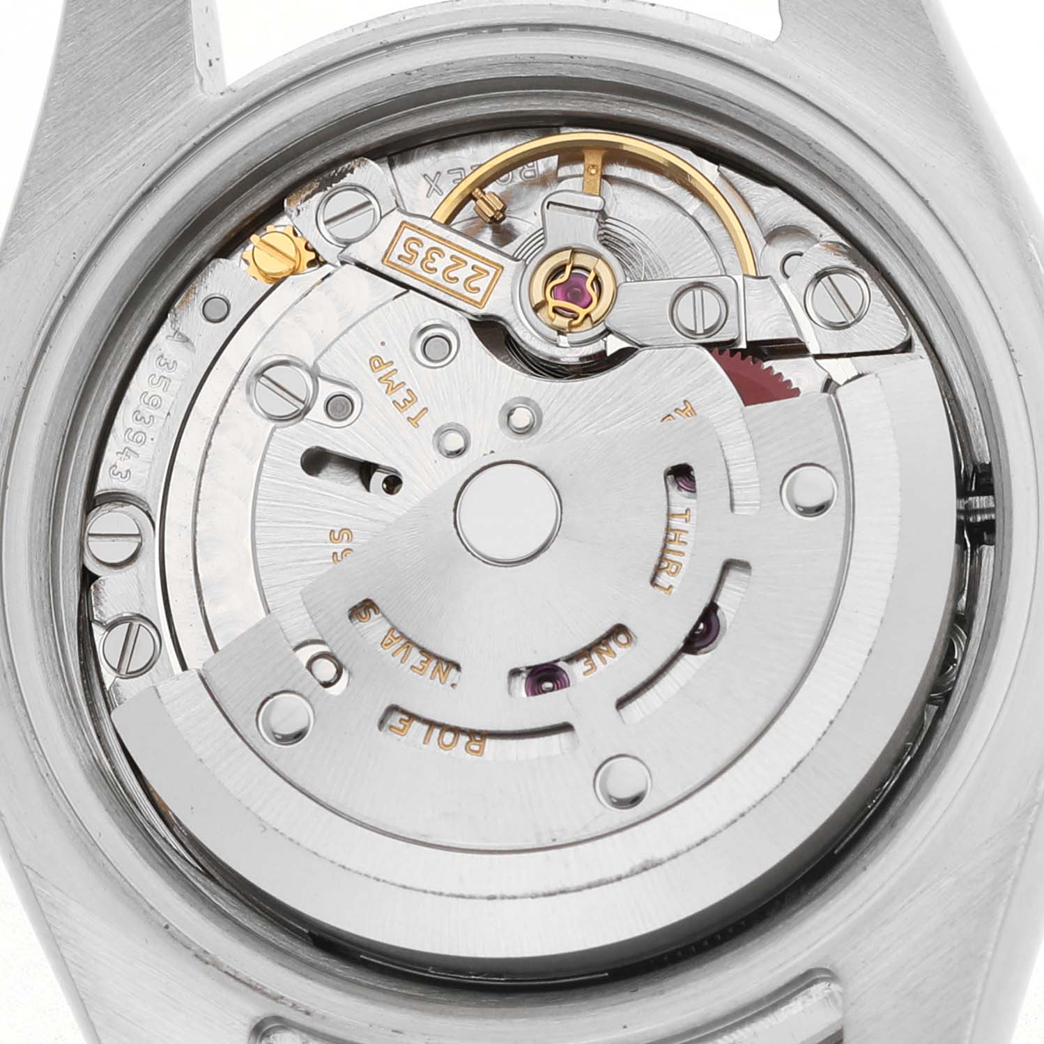 The image shows the movement mechanism of a Rolex Datejust 179384 Women's Stainless Steel Pink Dial watch from the back, highlighting gears and the rotor.