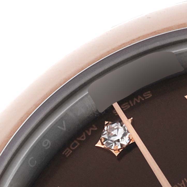 This image shows a close-up of the dial and bezel of the Rolex Datejust 279161 Women's Steel and Gold (two tone) Brown Dial 279161 Women's Steel and Gold (two tone) Brown Dial watch, highlighting a diamond hour marker.