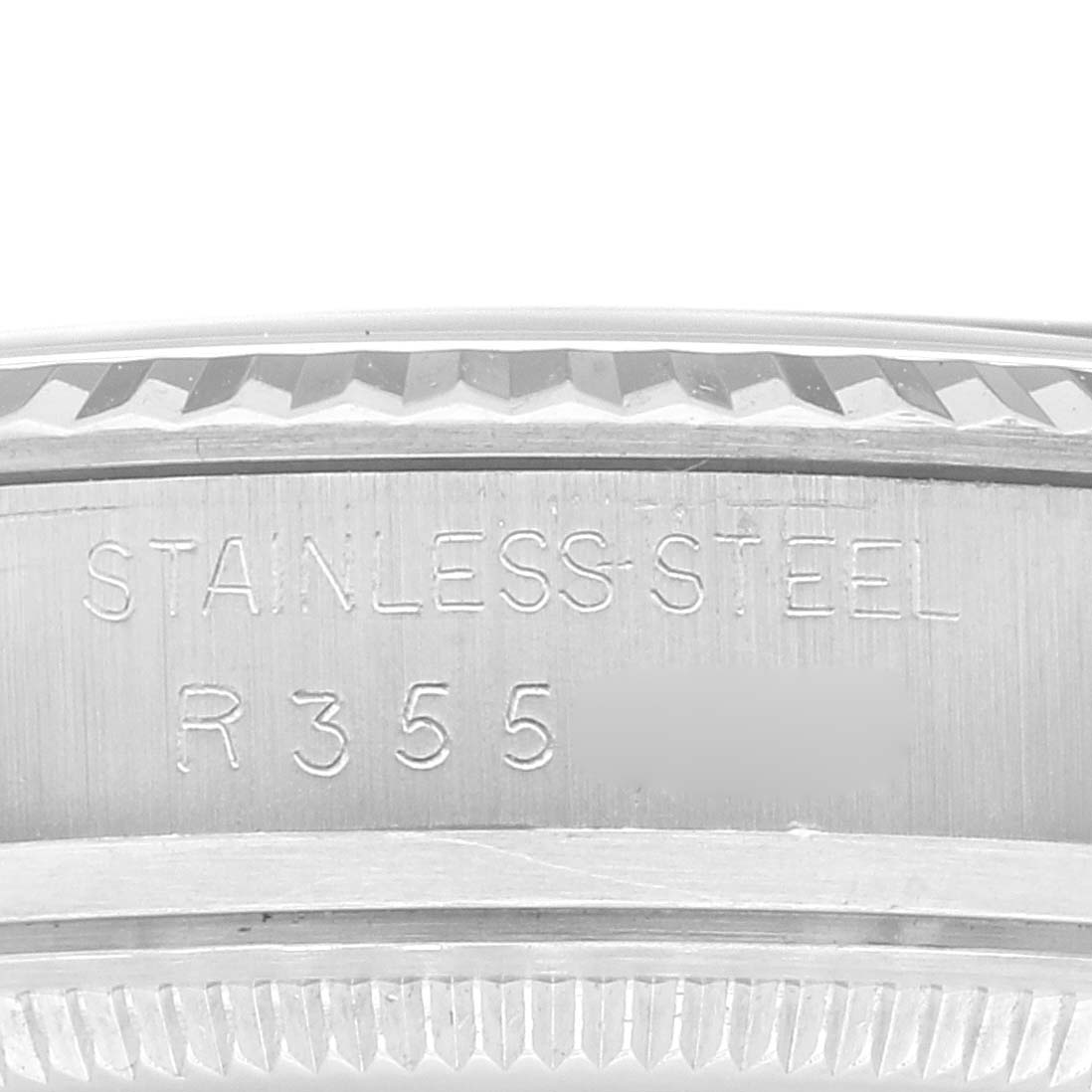 This image shows a close-up of the side engraving on a stainless steel Vintage Collection model by Rolex.