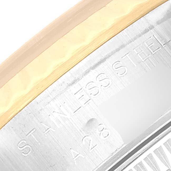 The image shows a close-up of the stainless steel case back with some engraving of the Rolex Datejust 79173 Women's Steel and Gold (two tone) Black Dial 79173 Women's Steel and Gold (two tone) Black Dial watch.