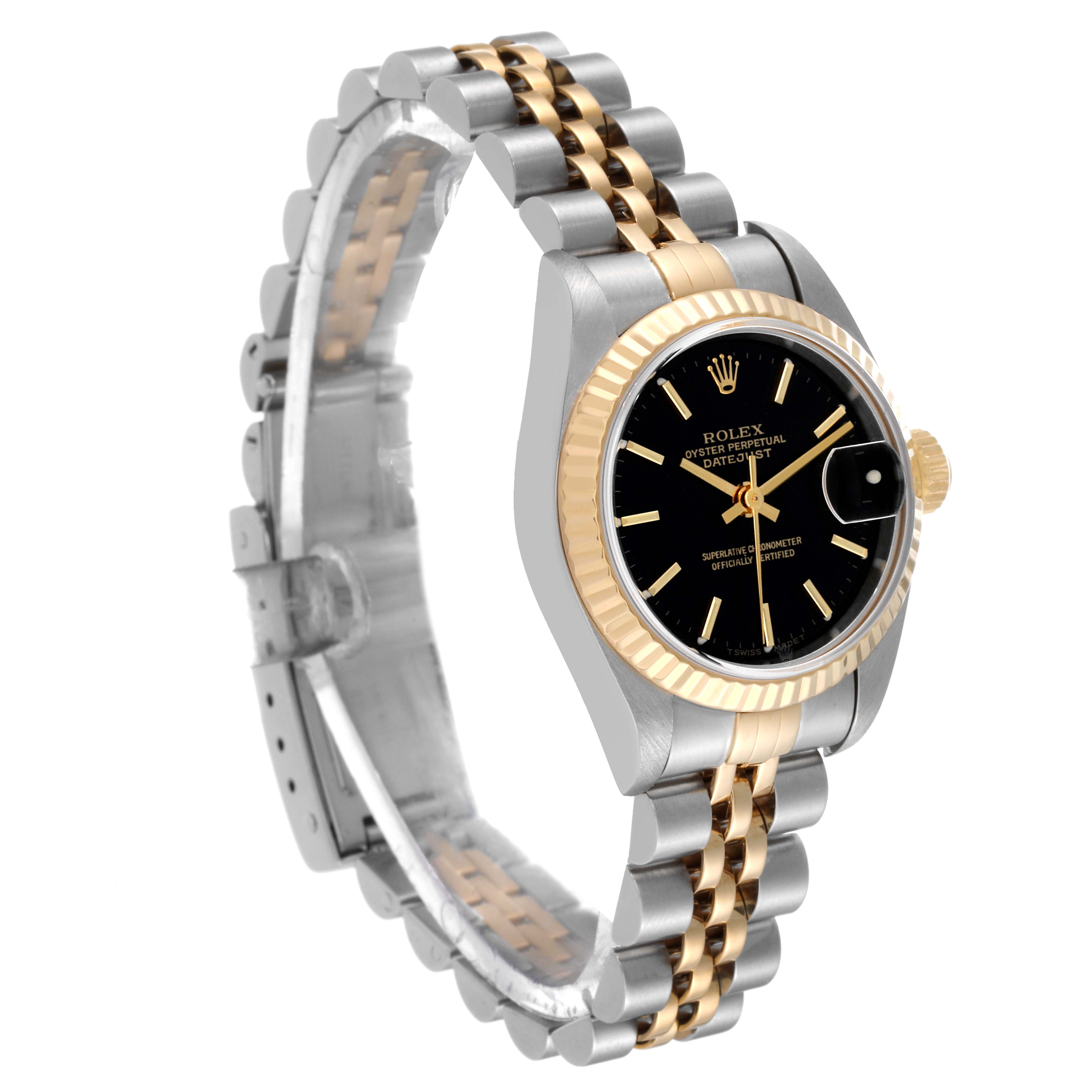 The image shows a Rolex Datejust 79173 Women's Steel and Gold (two tone) Black Dial 79173 Women's Steel and Gold (two tone) Black Dial watch at an oblique angle, displaying the face, bezel, and part of the bracelet.