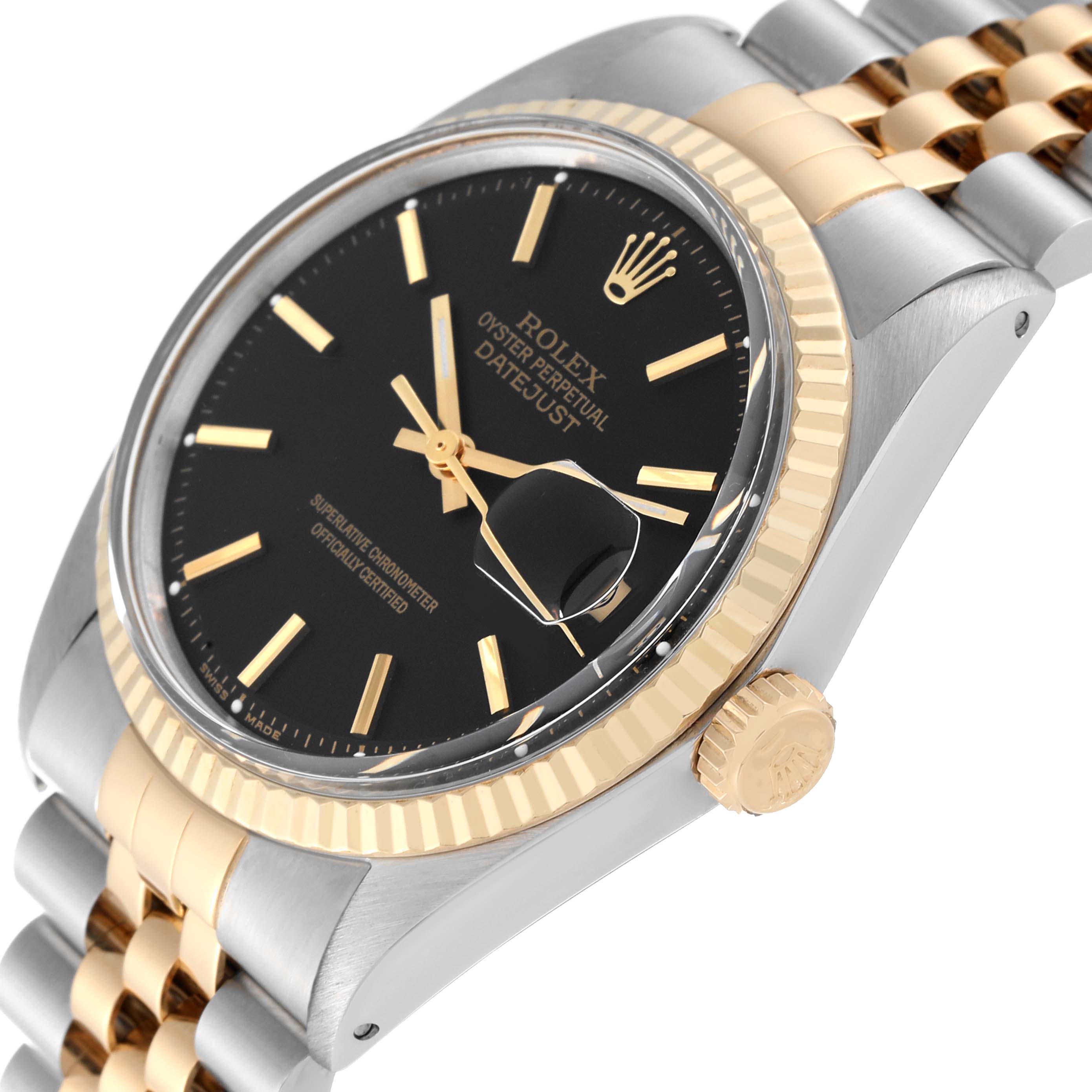 The image shows the Rolex Vintage Collection 1601/3 Men's Steel and Gold (two tone) Black Dial 1601/3 Men's Steel and Gold (two tone) Black Dial watch from an oblique angle, highlighting its face, bezel, and part of the bracelet.