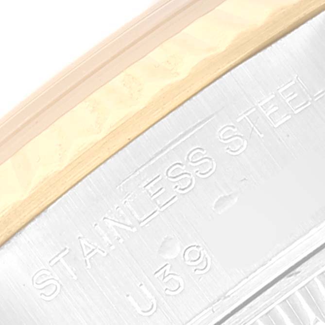 The image shows a close-up of the side engraving on a Rolex Datejust 69173 Women's Steel and Gold (two tone) Blue Dial 69173 Women's Steel and Gold (two tone) Blue Dial’s stainless steel casing.