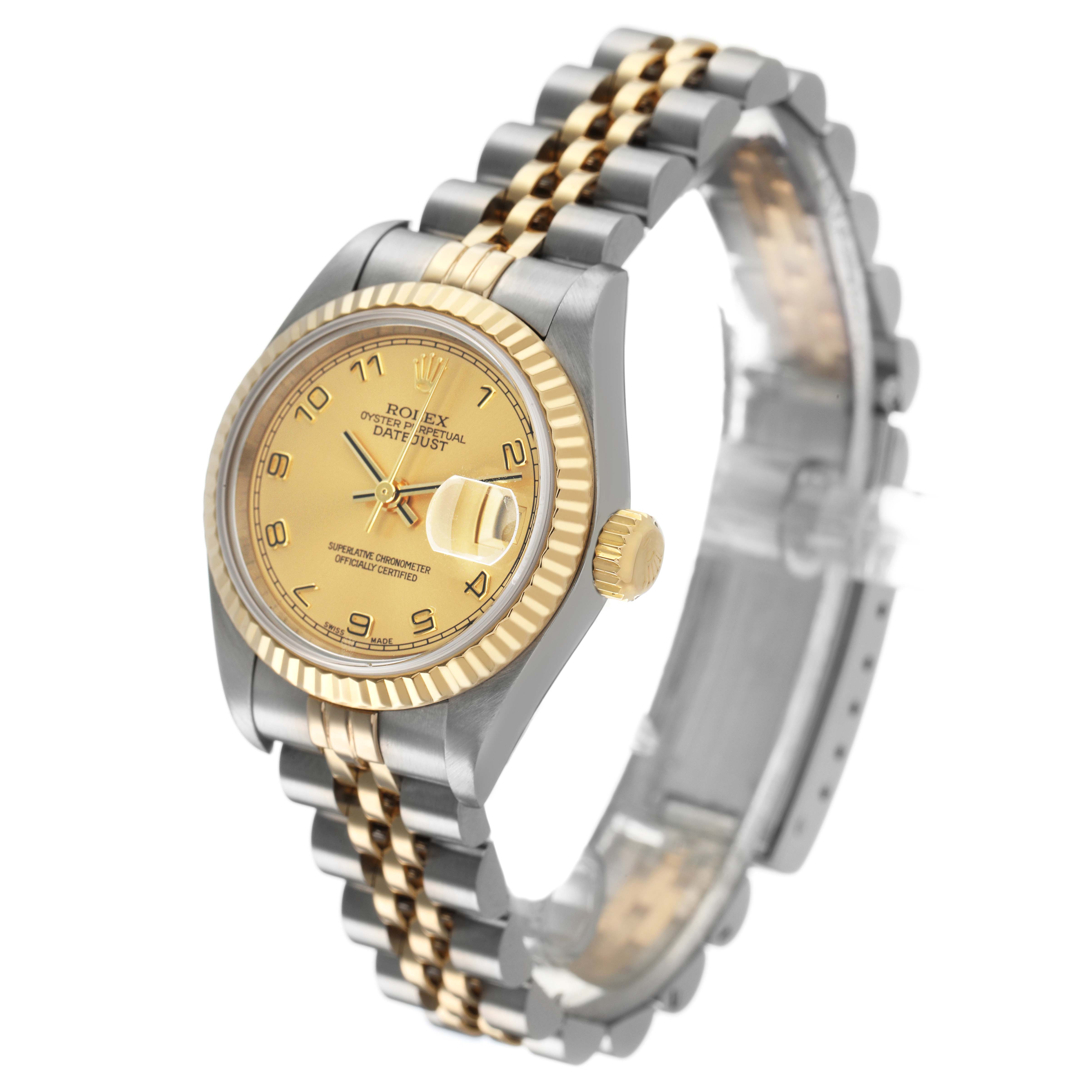 The Rolex Datejust 79173 Women's Stainless Steel Champagne Dial watch is shown at a slight angle, highlighting the face, bezel, crown, and bracelet.