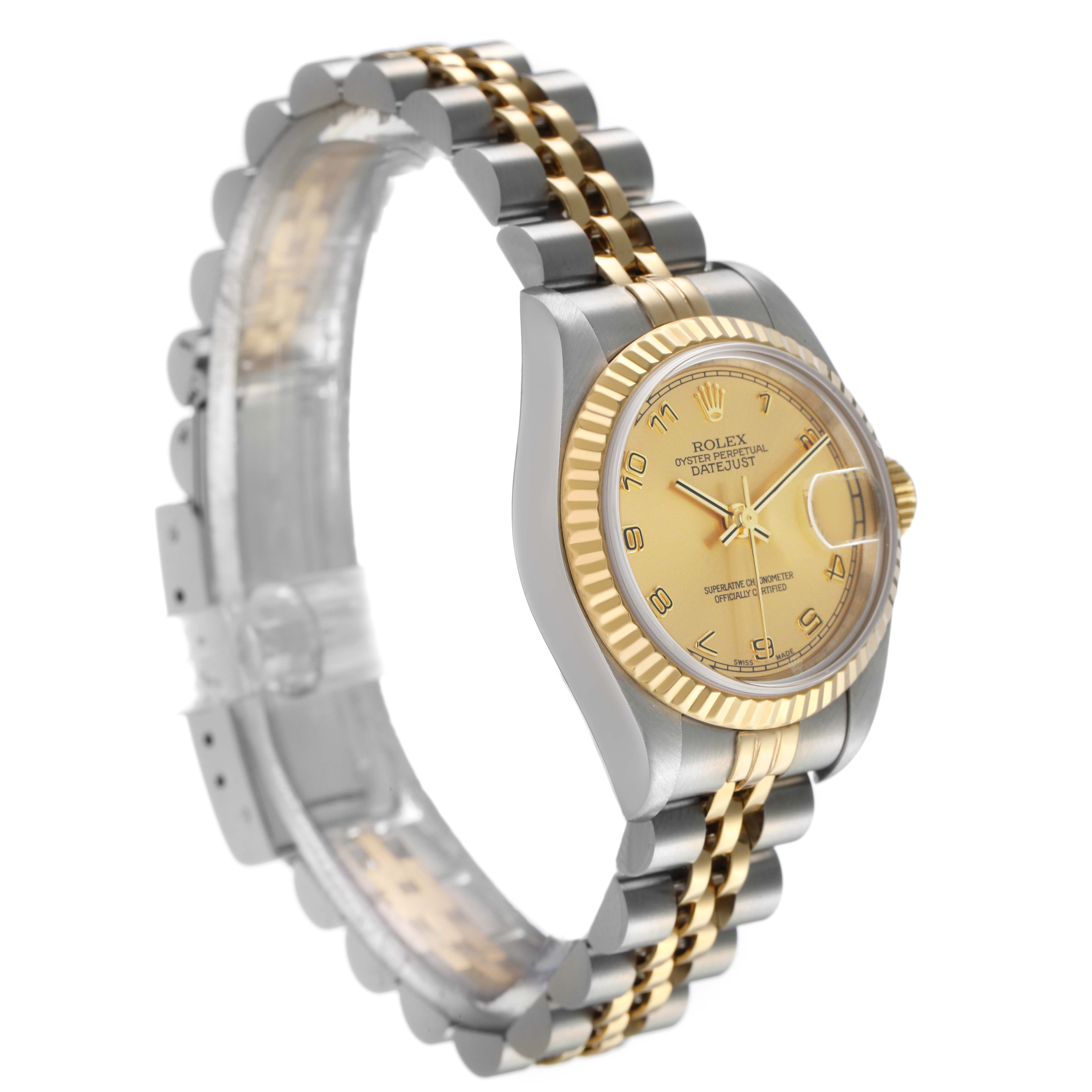 The Rolex Datejust 79173 Women's Stainless Steel Champagne Dial model is shown from a side angle, highlighting its gold dial, fluted bezel, and two-tone Jubilee bracelet.
