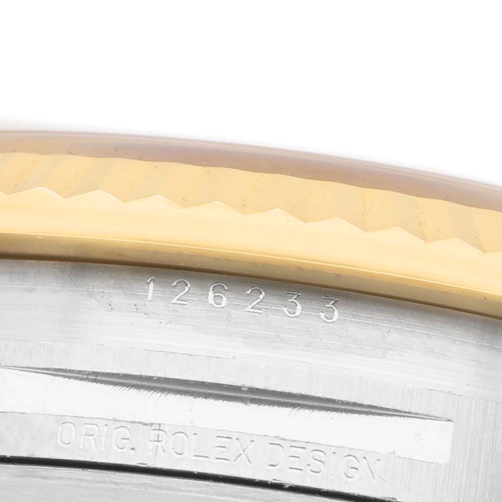 The image shows a close-up of the Rolex Datejust 126233 Men's Steel and Gold (two tone) Champagne Dial's case side, highlighting the model number engraving.