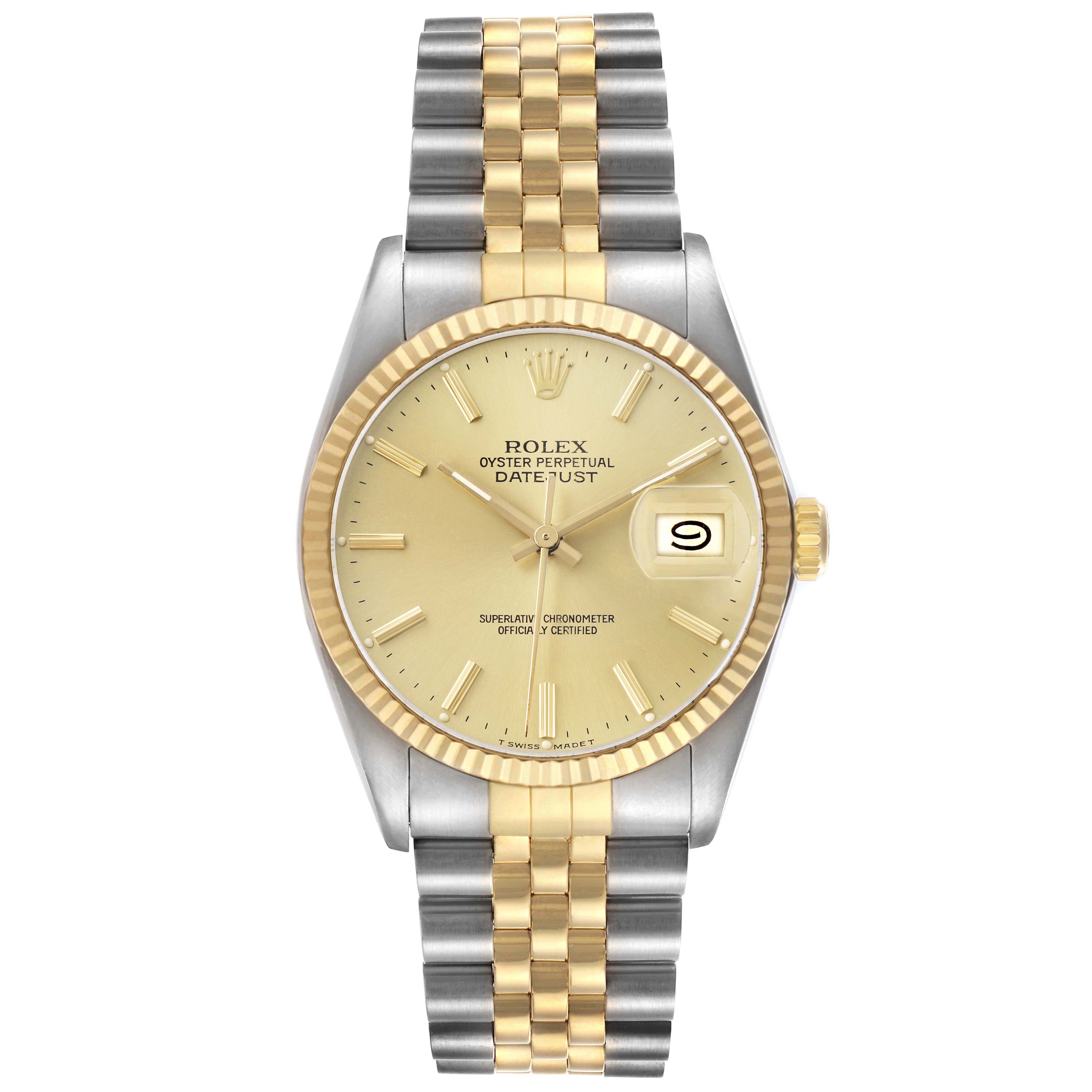 The Rolex Datejust 16013 Men's Steel and Gold (two tone) Champagne Dial watch is shown from a top-down angle, displaying its dial, gold fluted bezel, and two-tone Jubilee bracelet.