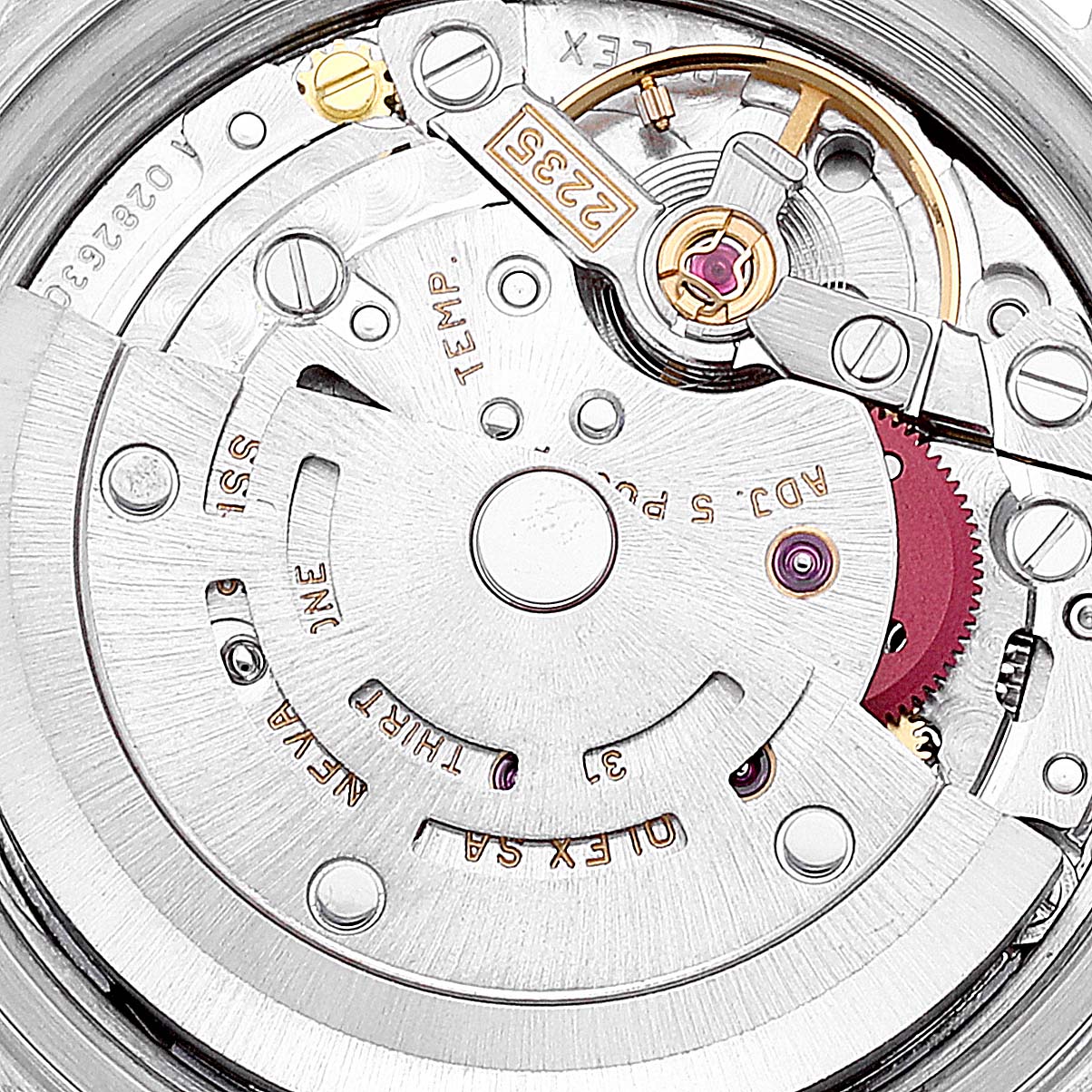 This image shows a close-up of the internal mechanism of a Rolex Datejust 79173 Women's Steel and Gold (two tone) Beige Dial 79173 Women's Steel and Gold (two tone) Beige Dial watch, focusing on the movement components.