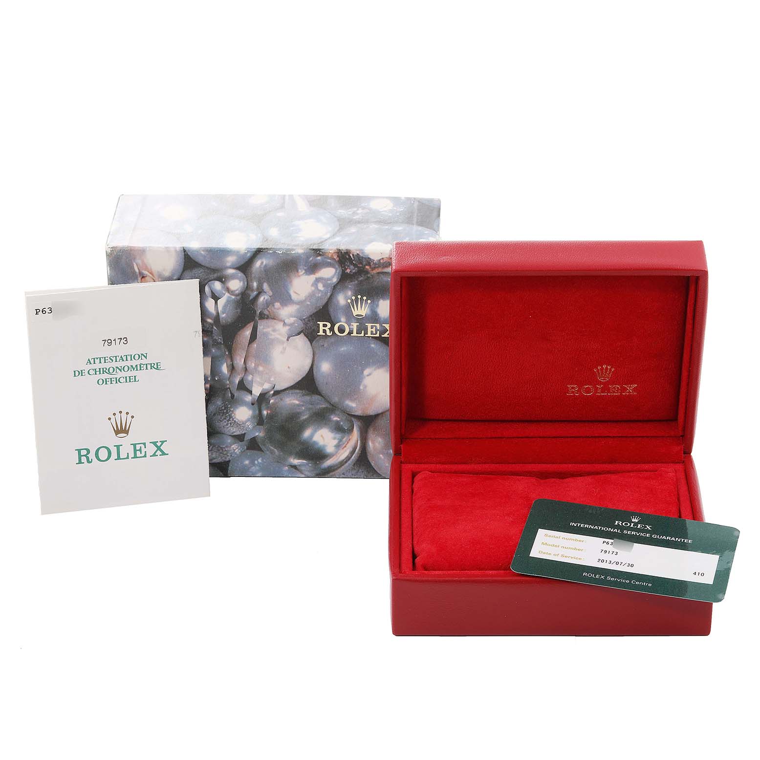 The image shows the box, certification, and guarantee card for a Rolex Datejust 79173 Women's Steel and Gold (two tone) Beige Dial 79173 Women's Steel and Gold (two tone) Beige Dial watch.