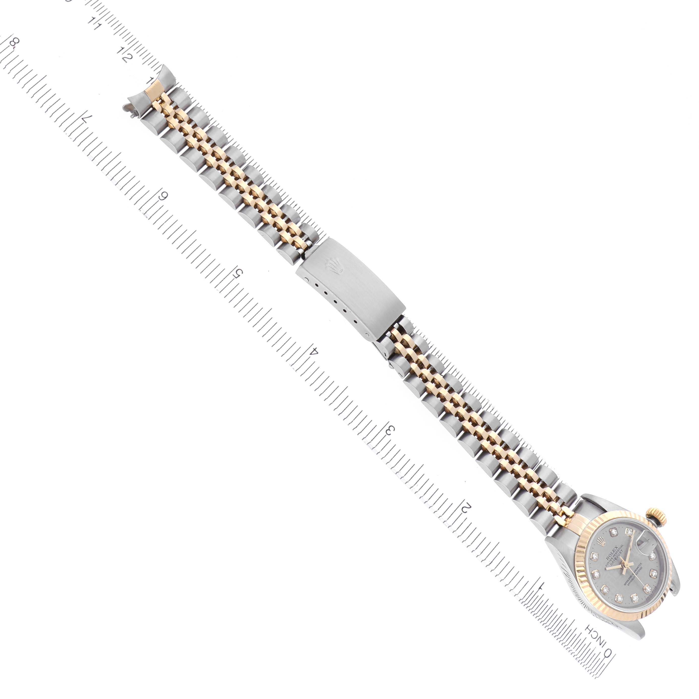 The image shows a Rolex Datejust 79173 Women's Steel and Gold (two tone) Grey Dial 79173 Women's Steel and Gold (two tone) Grey Dial watch laid out flat, displaying the bracelet, clasp, and face at a slight angle.