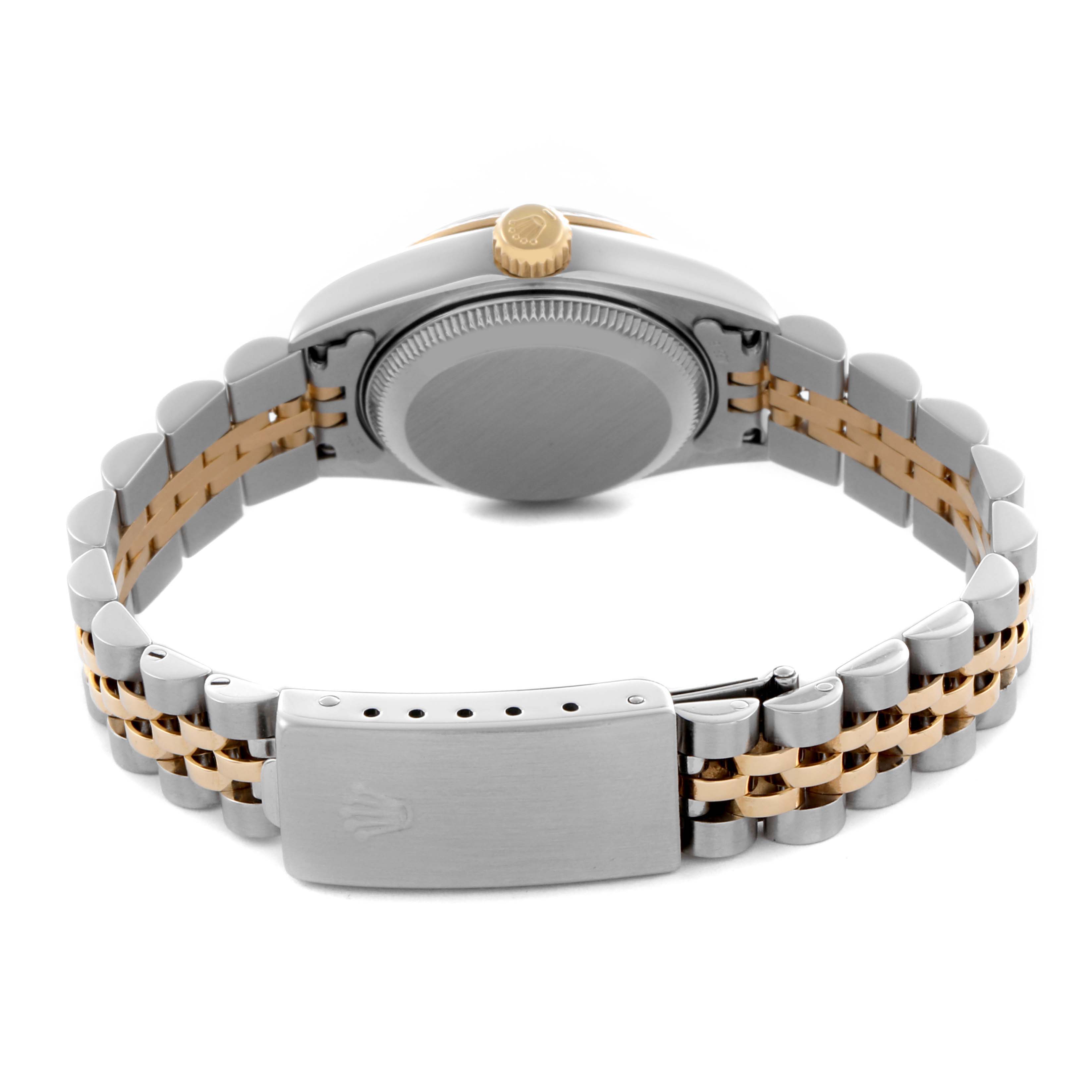 The Rolex Datejust 79173 Women's Steel and Gold (two tone) Grey Dial 79173 Women's Steel and Gold (two tone) Grey Dial watch is shown from the back, highlighting its clasp, bracelet, and case back.