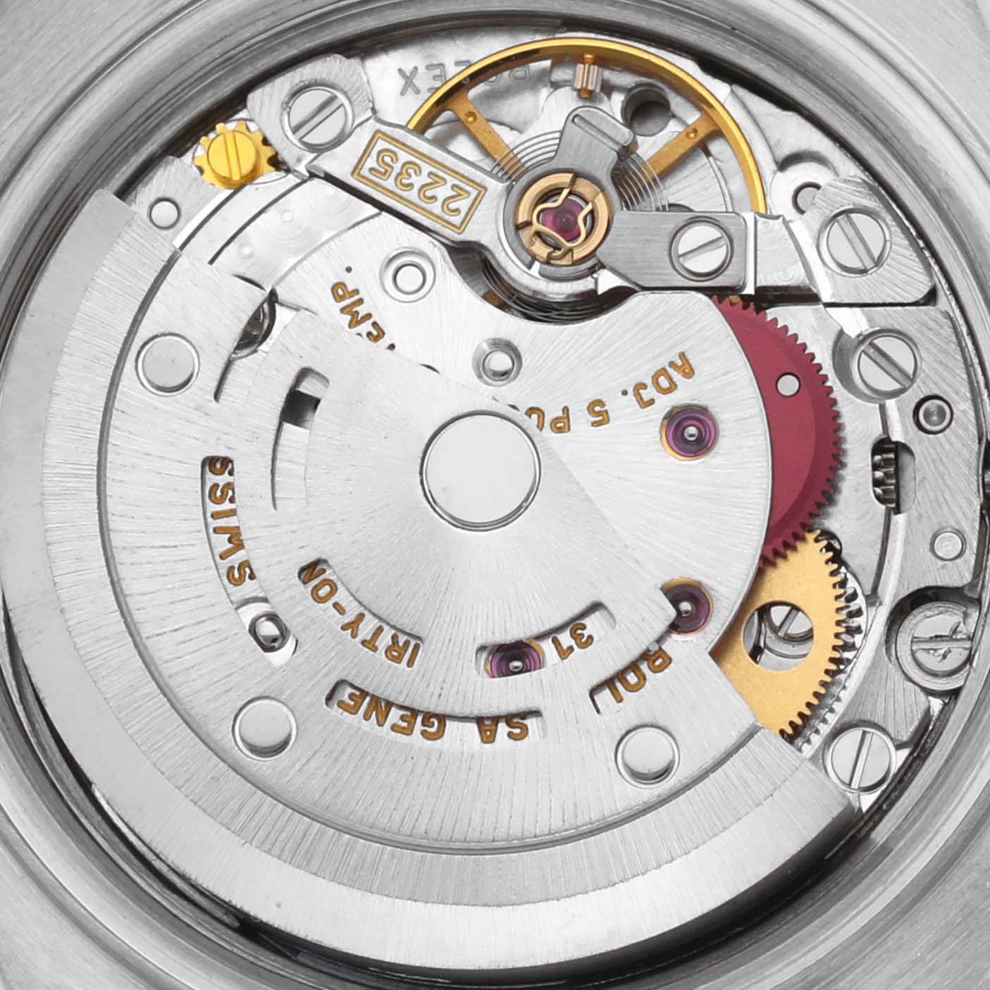 The image shows the intricate inner mechanism of a Rolex Datejust 79173 Women's Steel and Gold (two tone) Grey Dial 79173 Women's Steel and Gold (two tone) Grey Dial watch, highlighting gears and the oscillating weight from a top-down view.