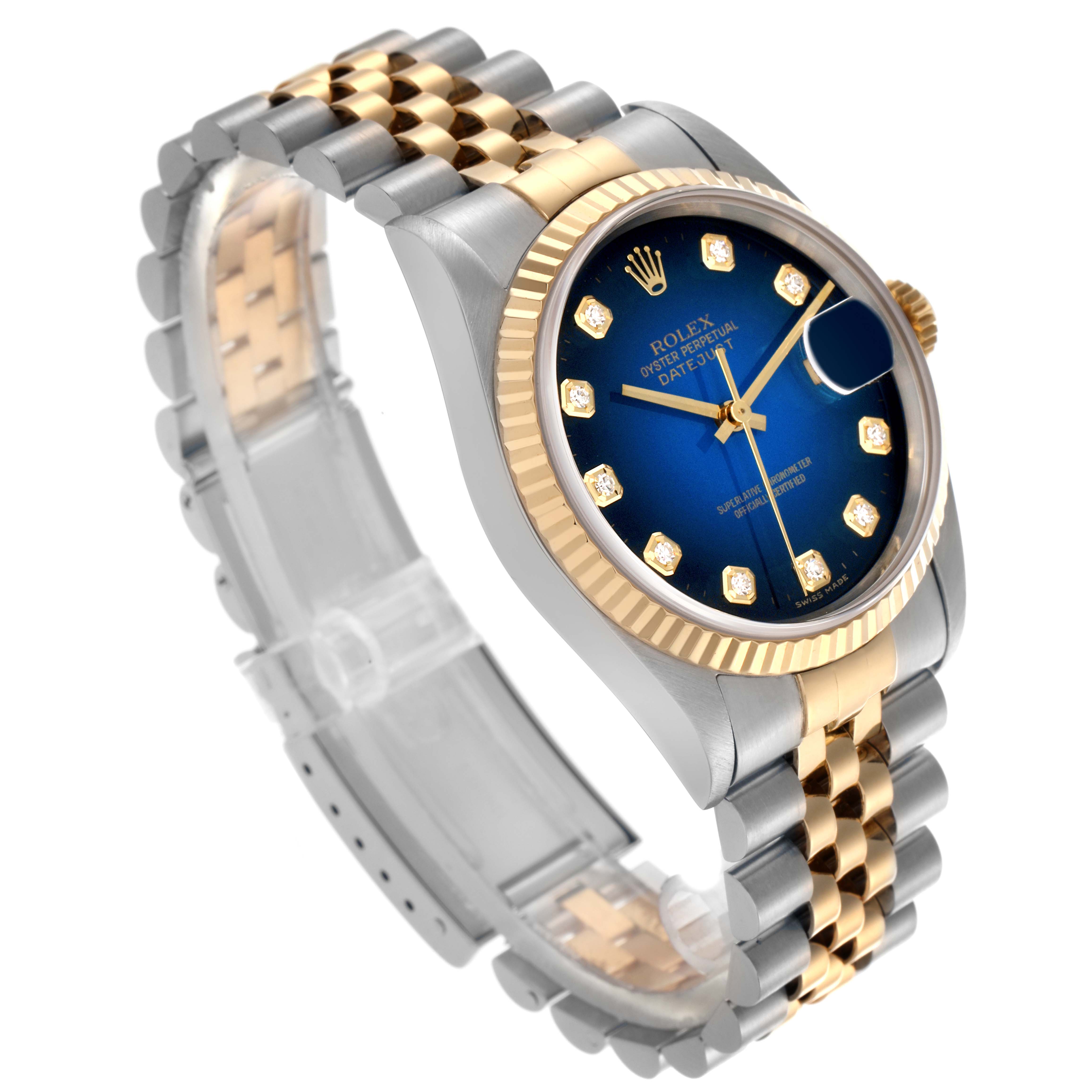 The Rolex Datejust 16233 Men's Steel and Gold (two tone) Blue Dial 16233 Men's Steel and Gold (two tone) Blue Dial watch is shown at an angled view, highlighting its blue dial, gold and silver bracelet, and fluted bezel.
