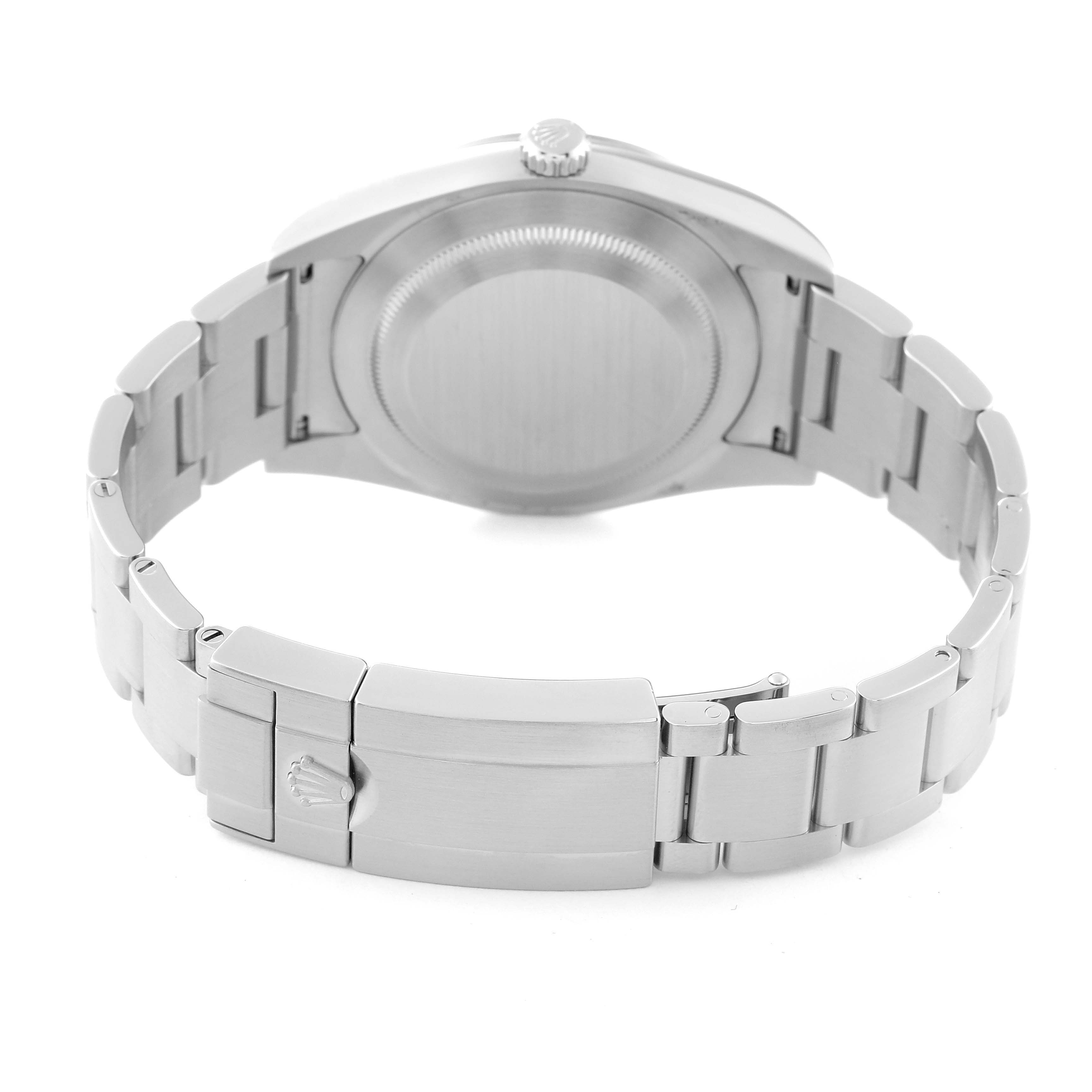 The image shows the back view of a Rolex Explorer 214270 Men
s Stainless Steel Black Dial 214270 Men
s Stainless Steel Black Dial watch, highlighting the bracelet, clasp, and case back.