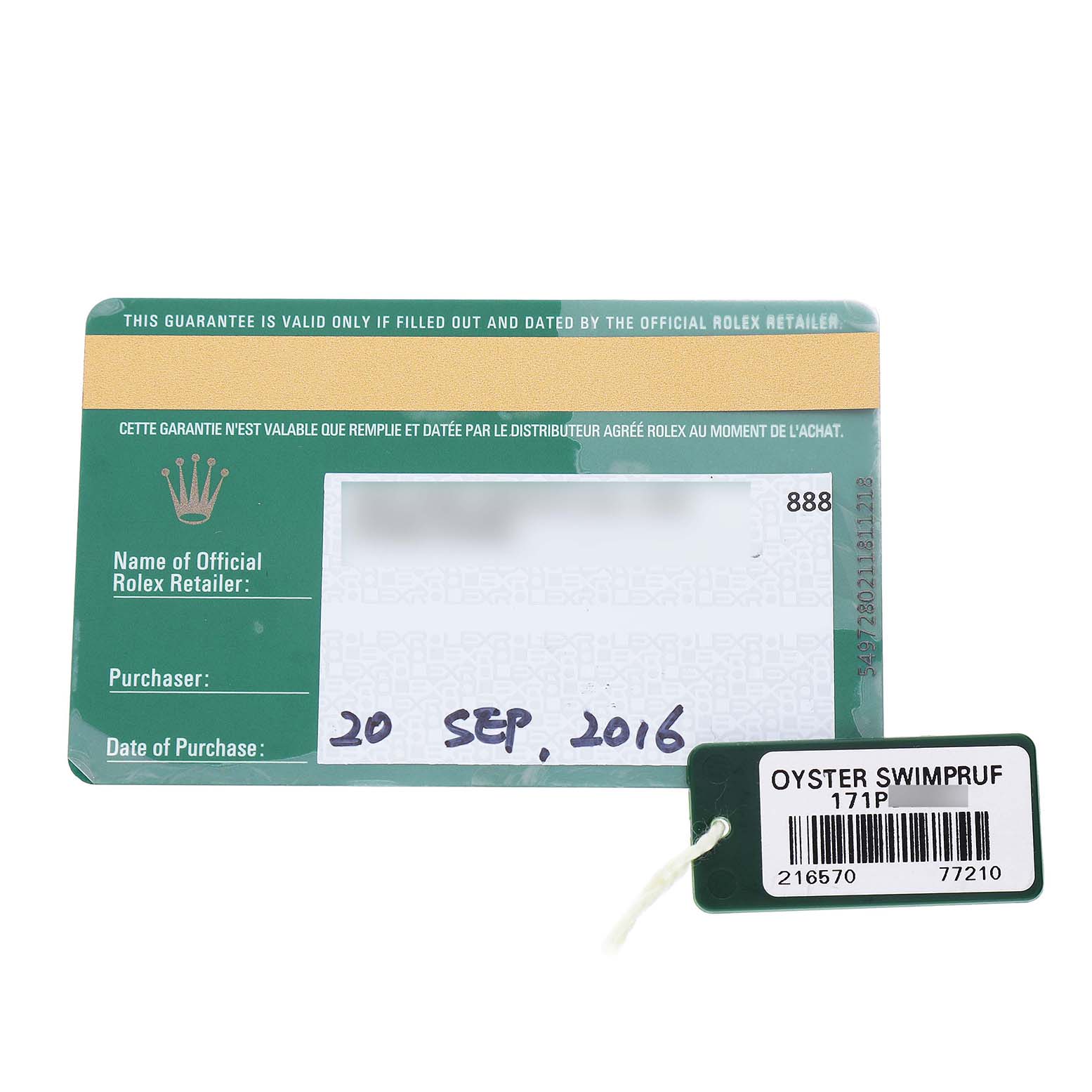 The image shows a warranty card and a tag for the Rolex Explorer 216570 Men's Stainless Steel Black Dial model.