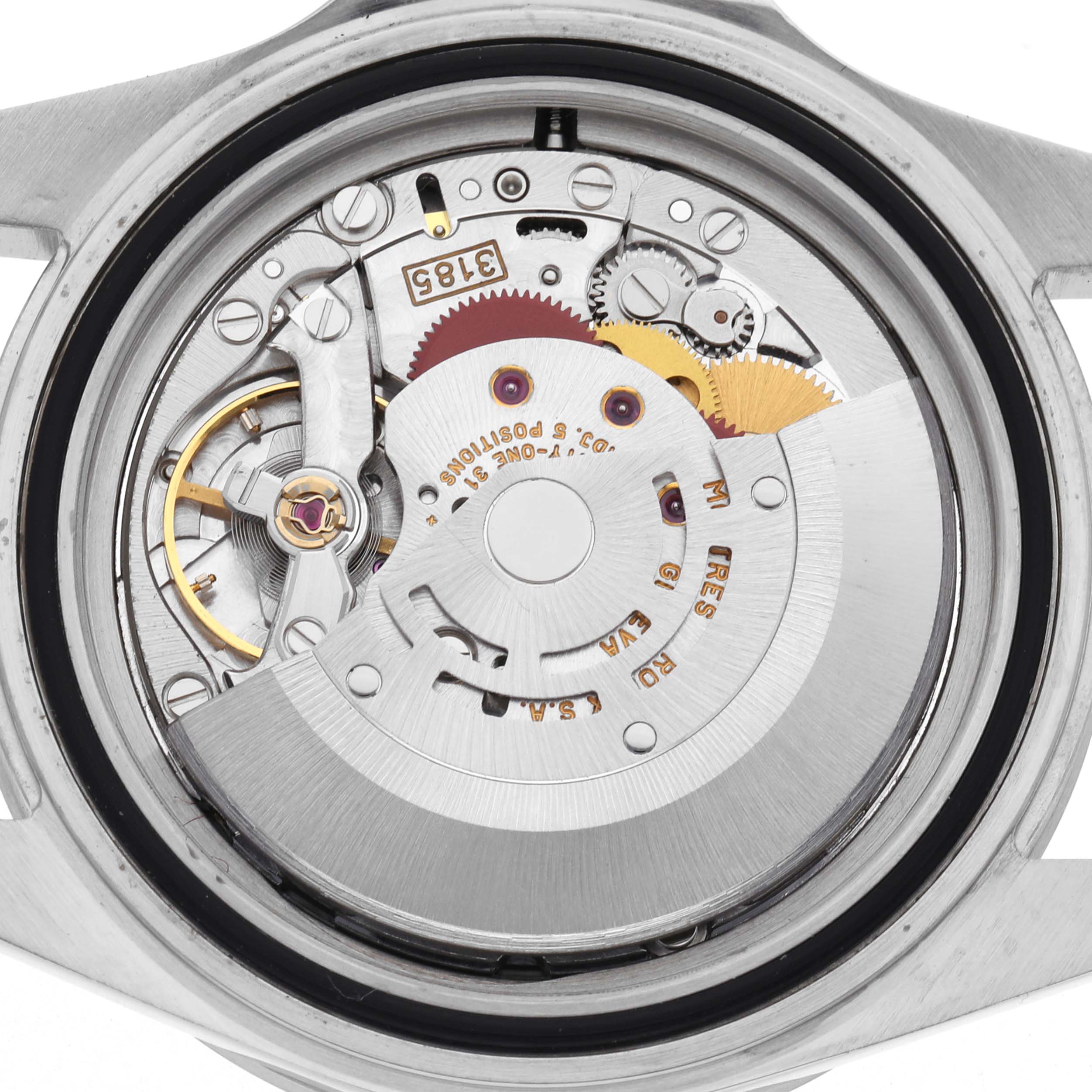 The image shows the movement of a Rolex Explorer 16570 Men's Stainless Steel White Dial 16570 Men's Stainless Steel White Dial watch from a rear view, highlighting gears and rotors.