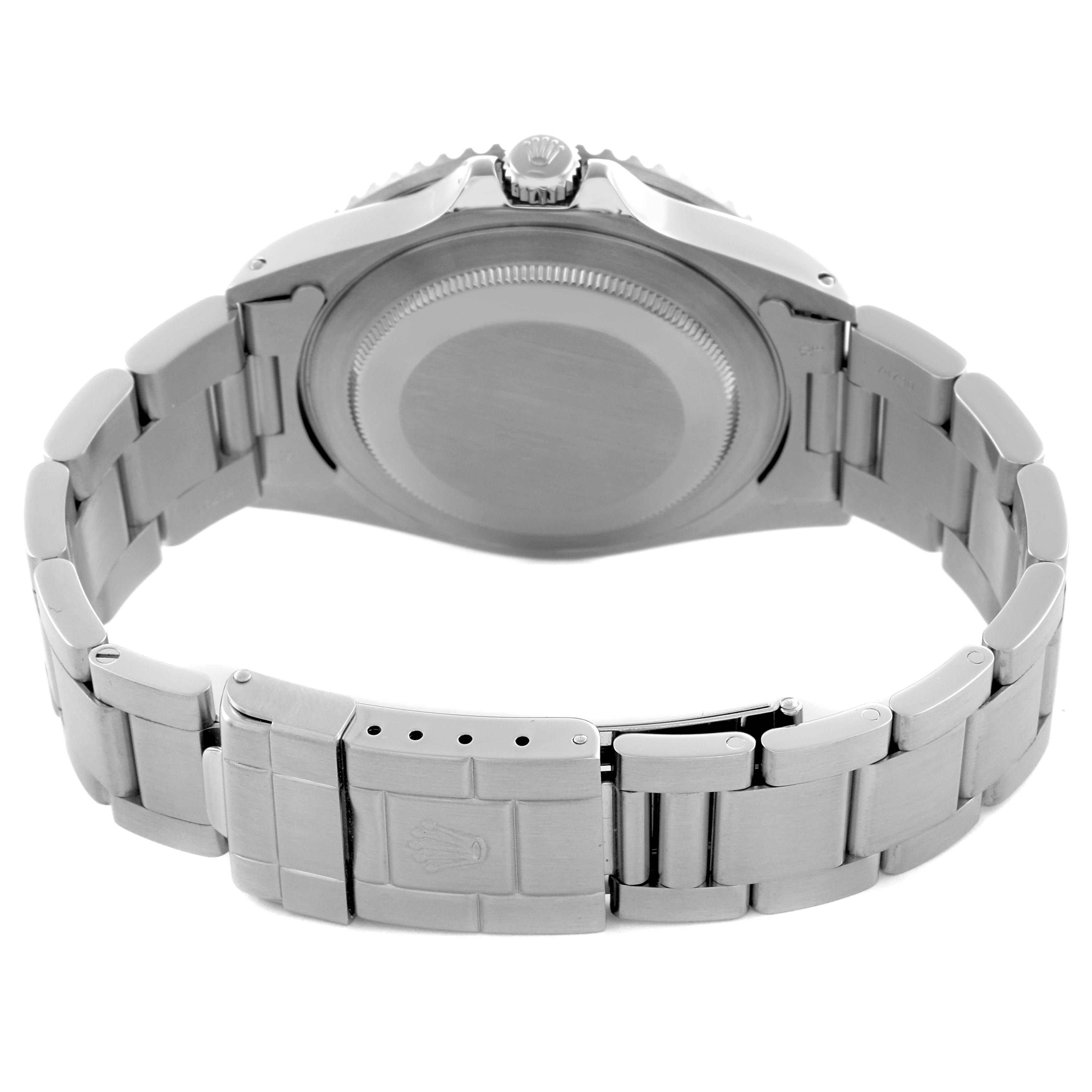 The image shows a rear view of the Rolex GMT-Master 16700 Men's Stainless Steel Black Dial 16700 Men's Stainless Steel Black Dial, displaying the case back and bracelet with the fold-over clasp.