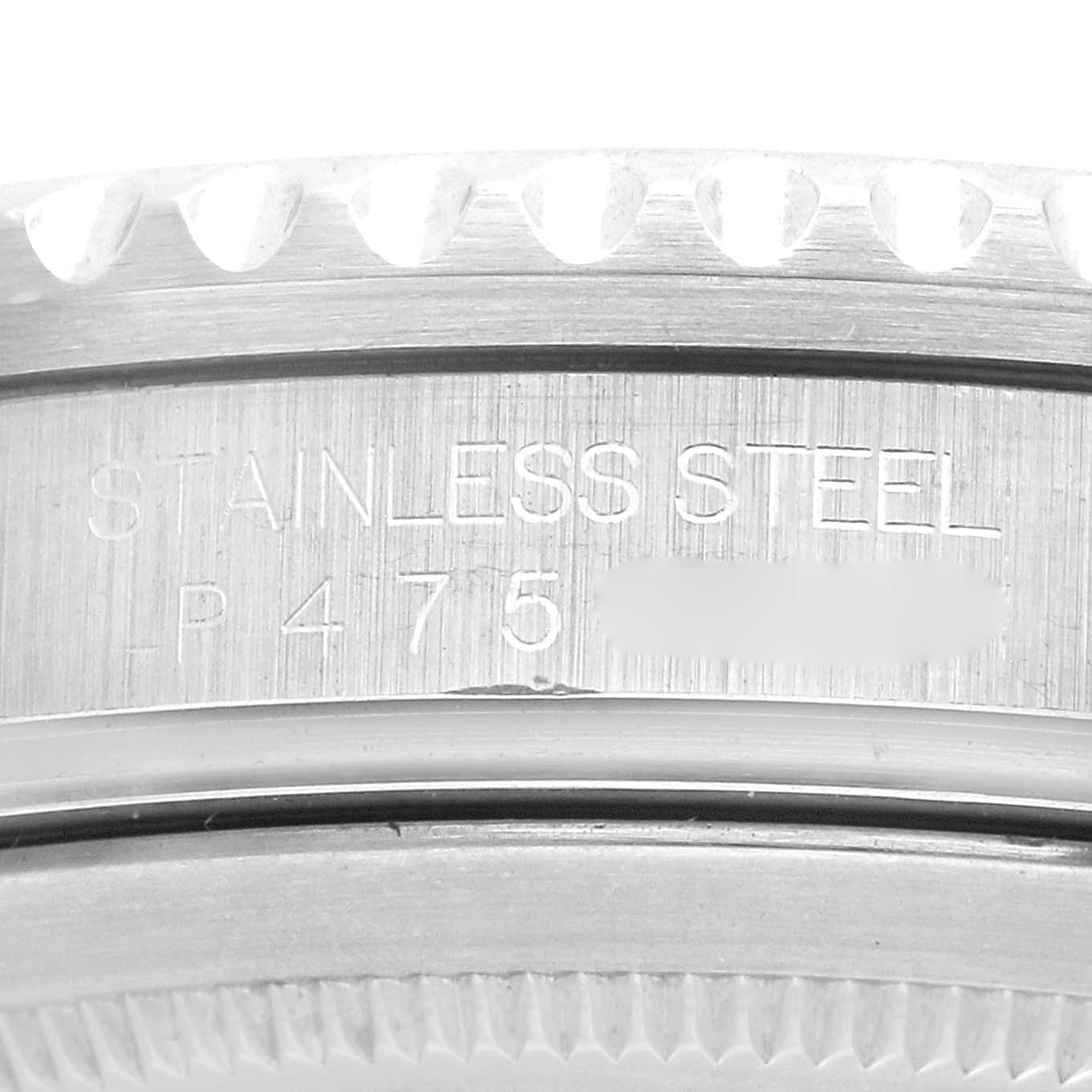 The image shows a close-up view of the stainless steel case back and serial engraving on a Rolex GMT-Master 16710 Men's Stainless Steel Black Dial 16710 Men's Stainless Steel Black Dial watch.