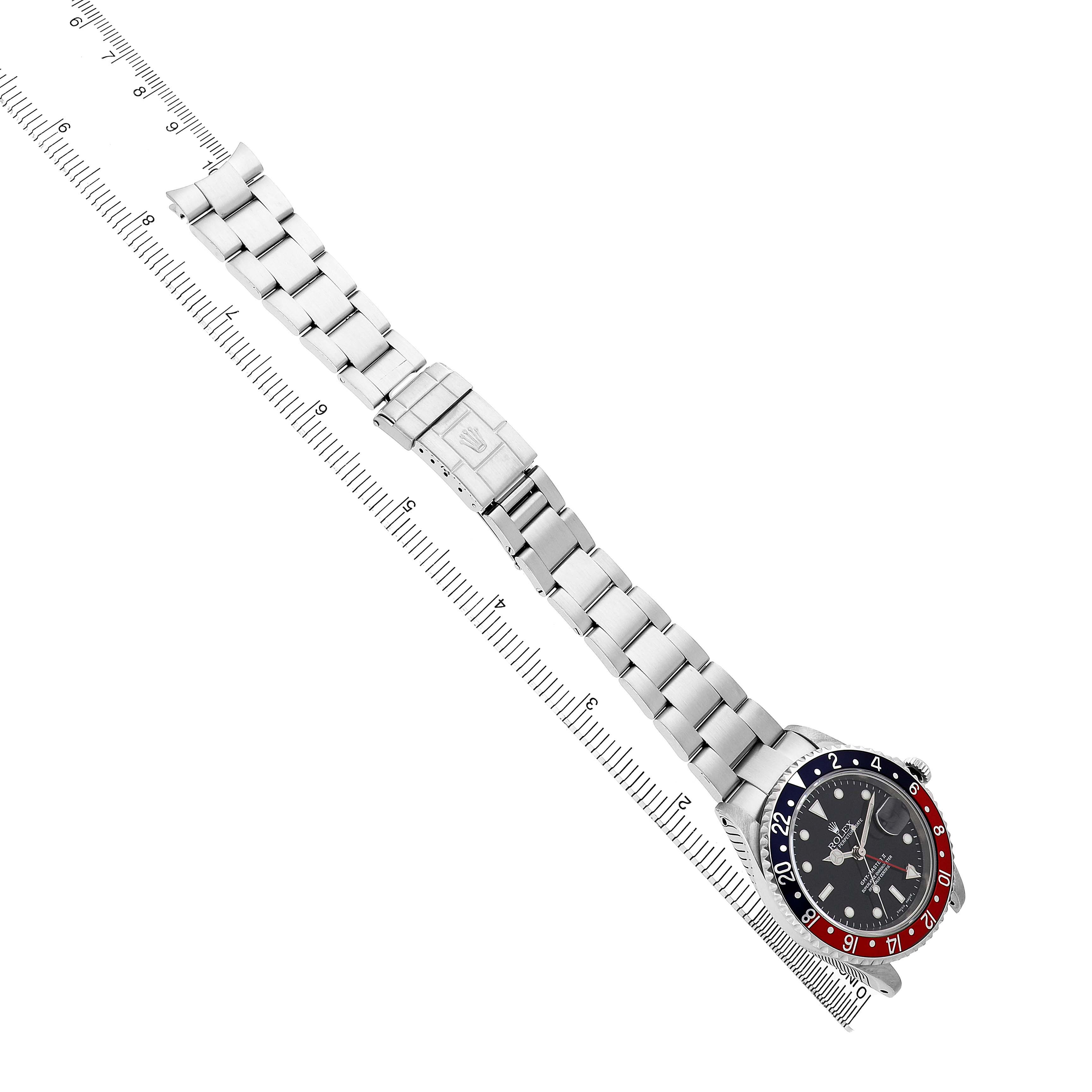 The Rolex GMT-Master 16710 Men's Stainless Steel Black Dial watch is shown from a top-down angle, displaying the full bracelet and bezel.