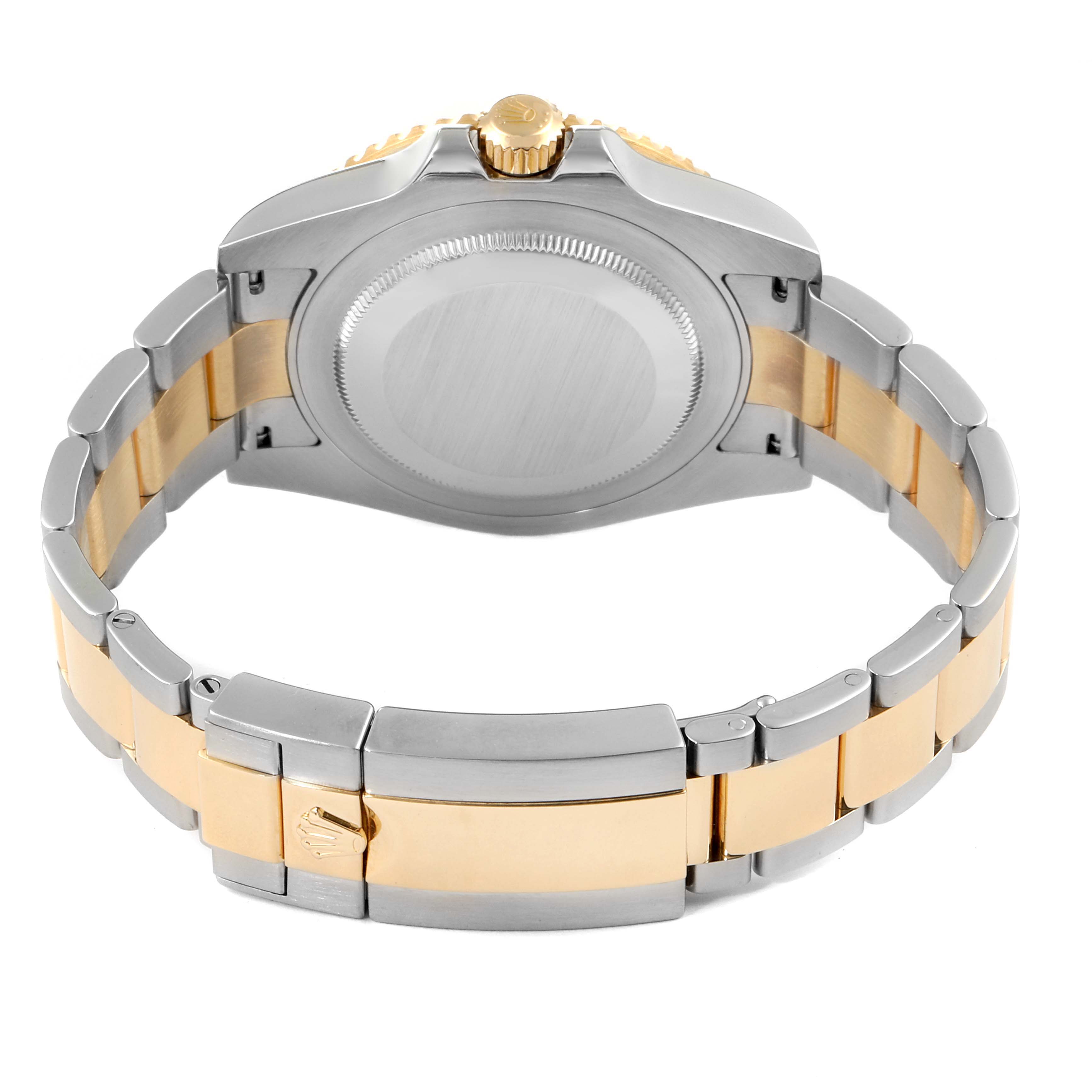 The image shows the back case, crown, and bracelet of a Rolex GMT-Master 116713 Men's Steel and Gold (two tone) Black Dial 116713 Men's Steel and Gold (two tone) Black Dial watch from a rear angle.