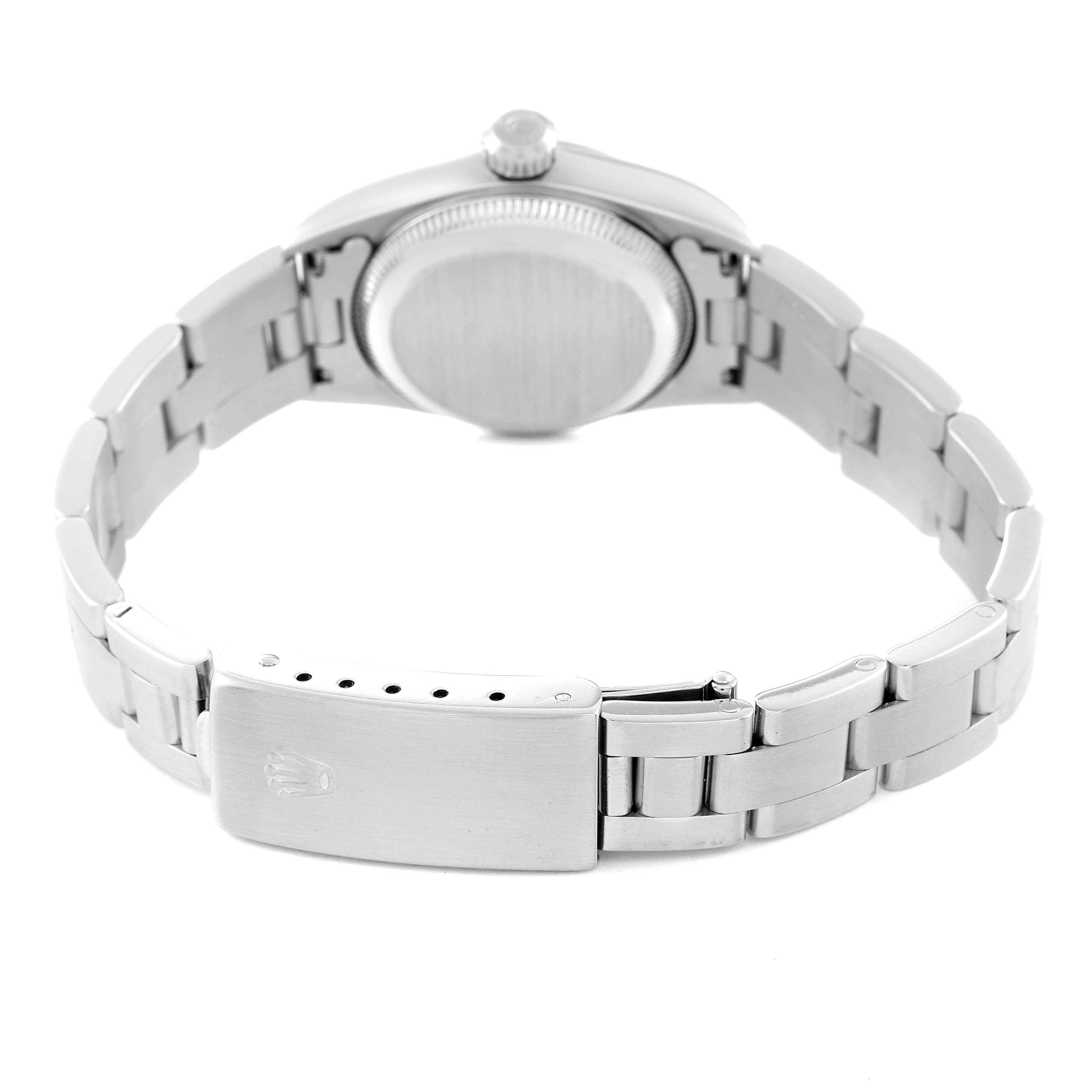 The image shows the back view of a Rolex Oyster Perpetual 67180 Women's Stainless Steel Blue Dial 67180 Women's Stainless Steel Blue Dial watch, including the caseback and the bracelet with its clasp.