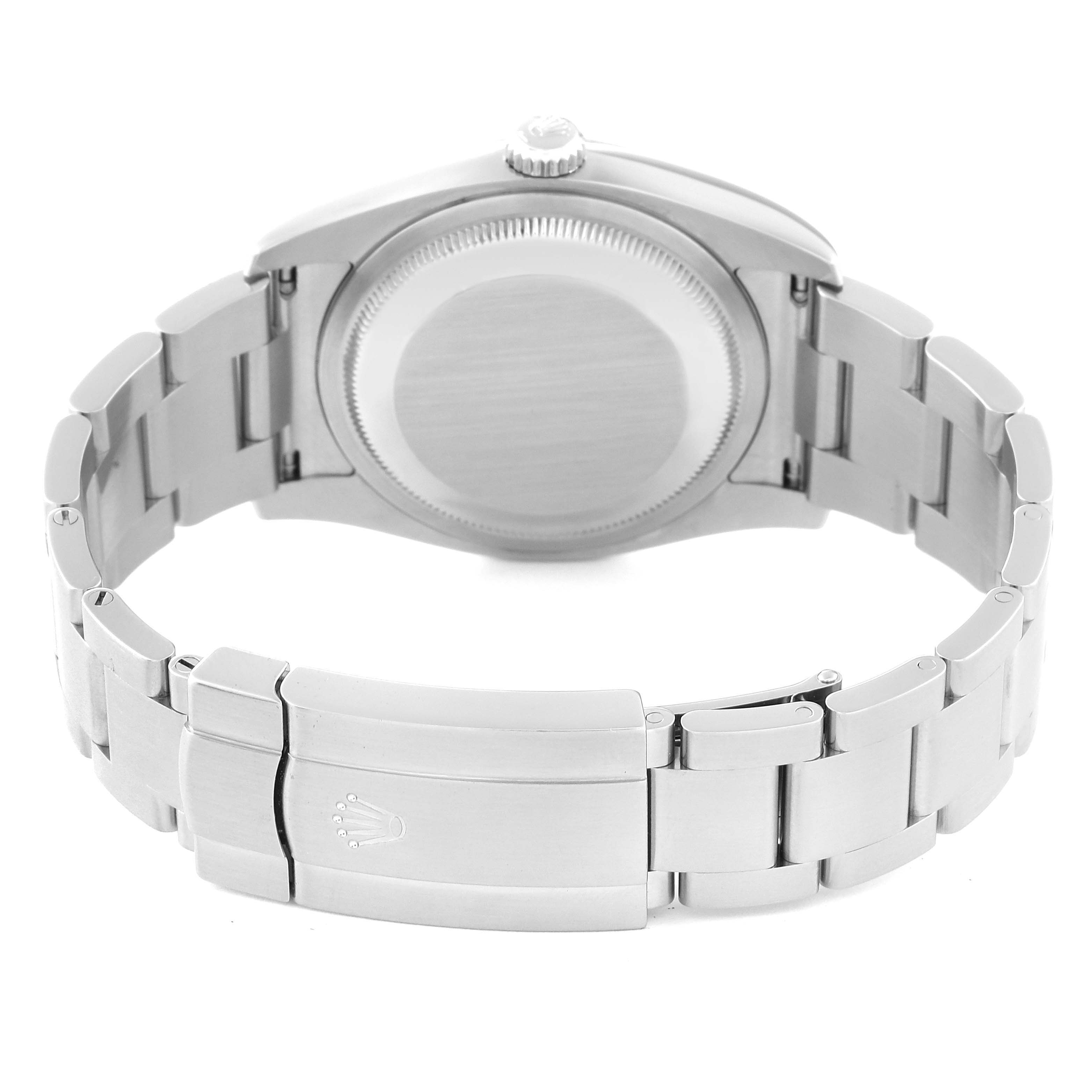 The image shows the backside and bracelet of a Rolex Oyster Perpetual 116000 Men
s Stainless Steel Purple Dial 116000 Men
s Stainless Steel Purple Dial watch, focusing on the clasp and case back.