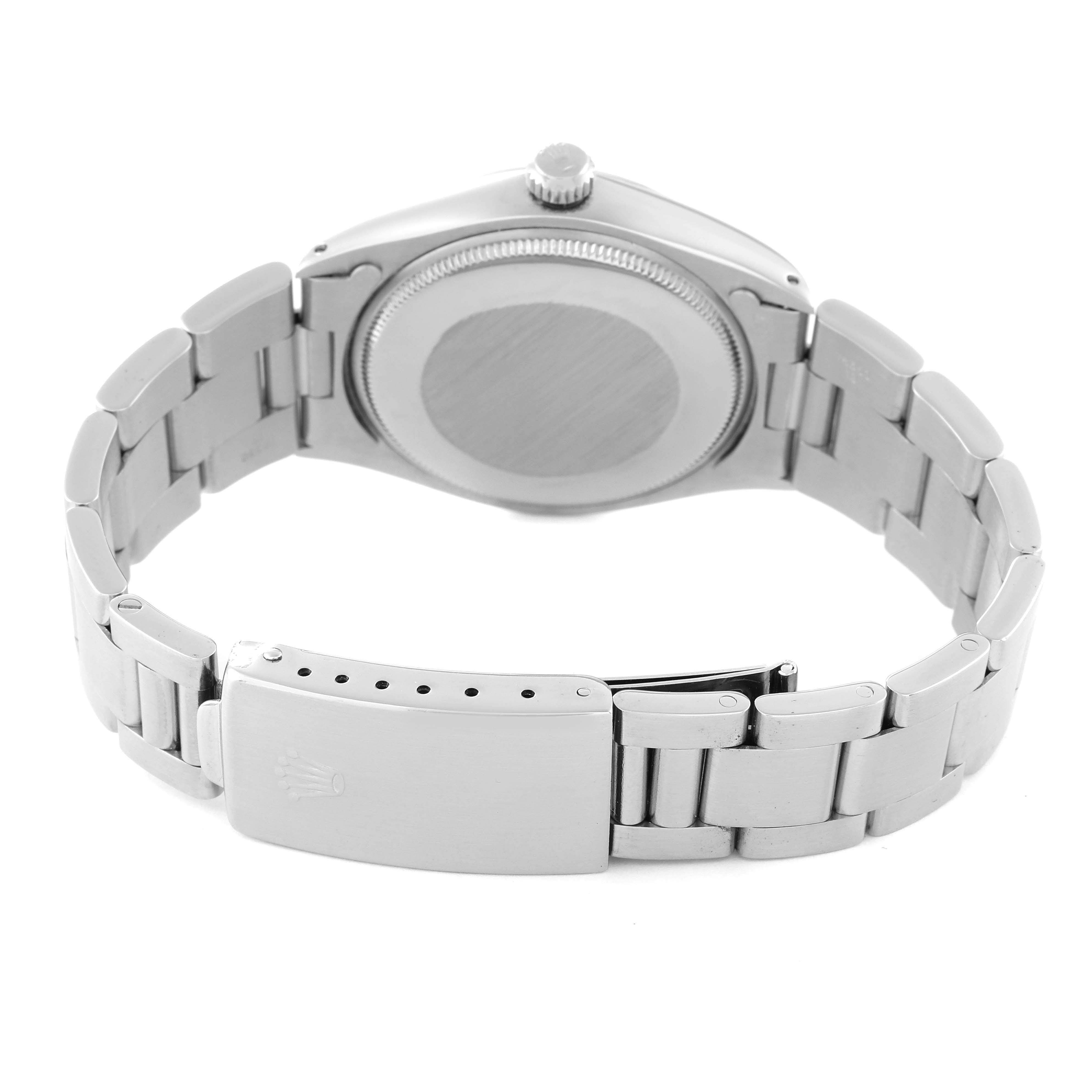 This image shows the back view of the Rolex Vintage Collection 1002 Men's Stainless Steel Silver Dial 1002 Men's Stainless Steel Silver Dial watch, focusing on the case back and the clasp of the bracelet.