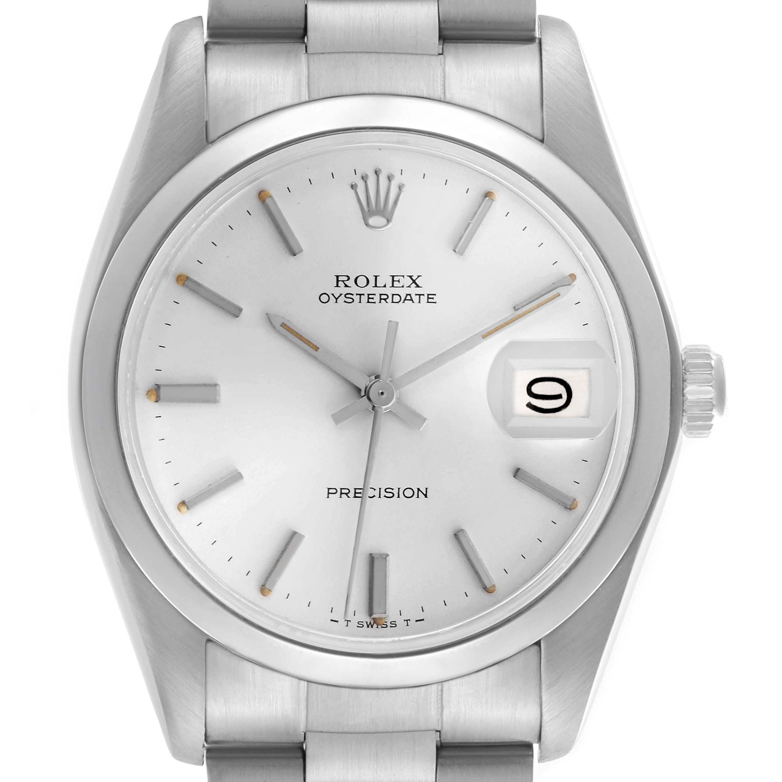 The image shows a front view of the Rolex Oysterdate Precision watch, highlighting the dial, hands, crown, and date window.