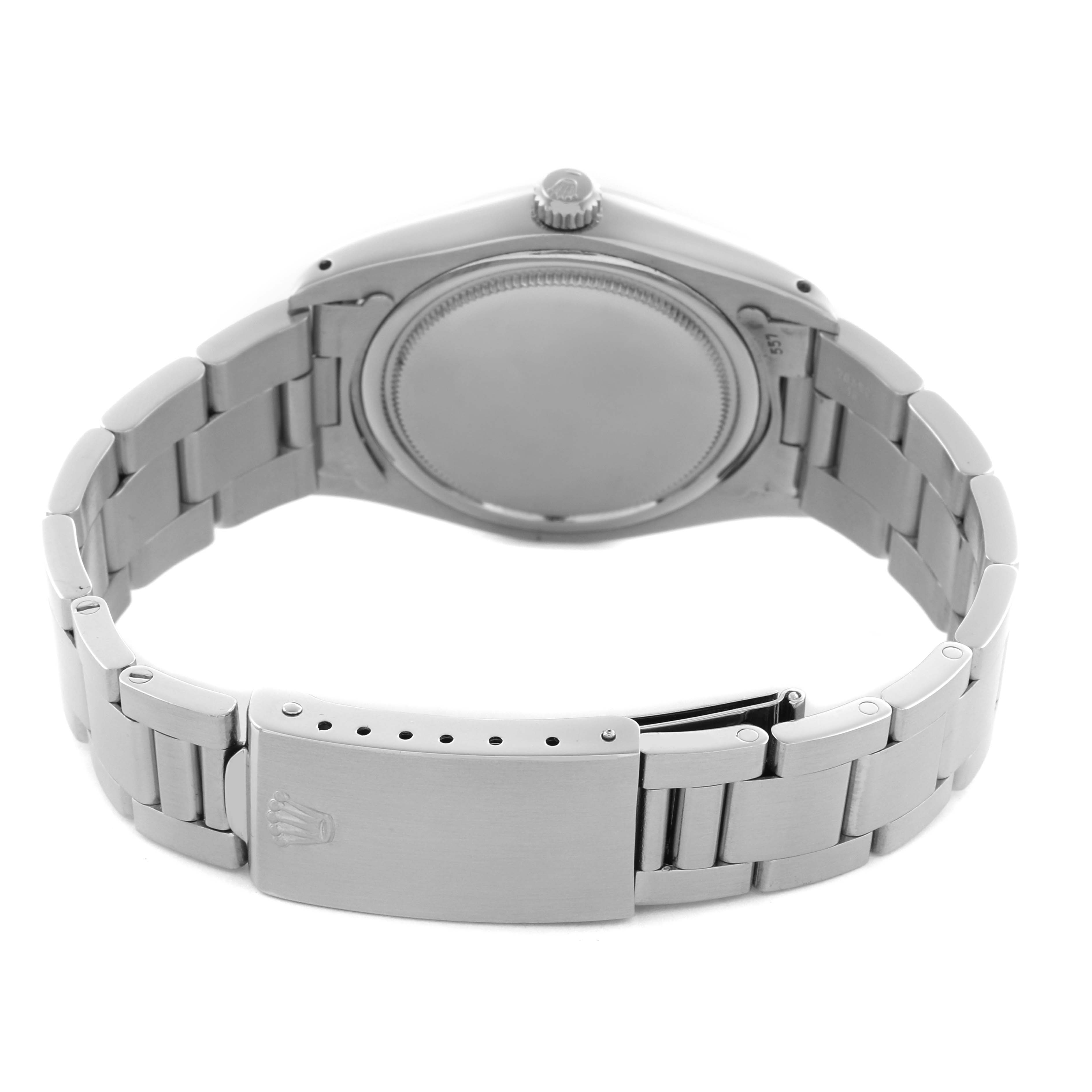 The Rolex Date 6694 Men's Stainless Steel Silver Dial 6694 Men's Stainless Steel Silver Dial model watch is shown from the back, displaying the case back, crown, and bracelet with clasp.